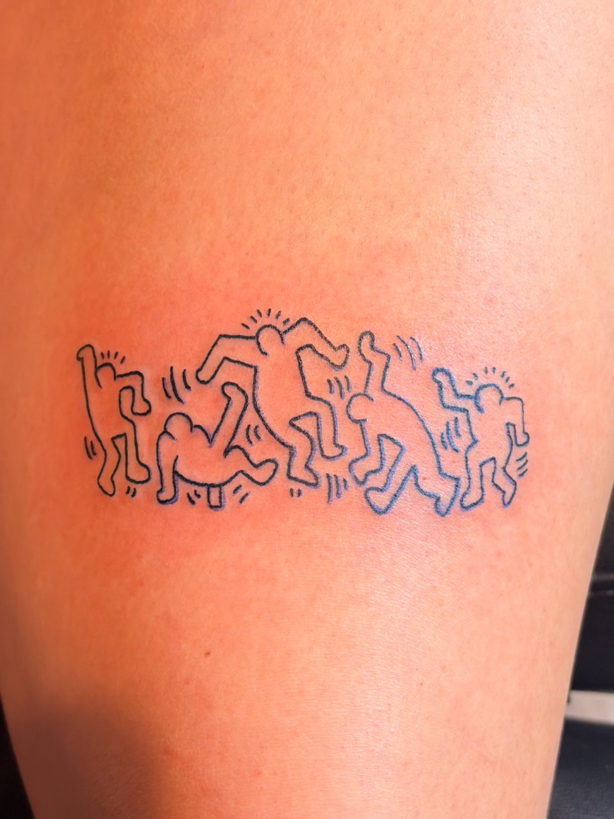 Dancing figures new school tattoo on the thigh by Inky Birdz Tattoos
