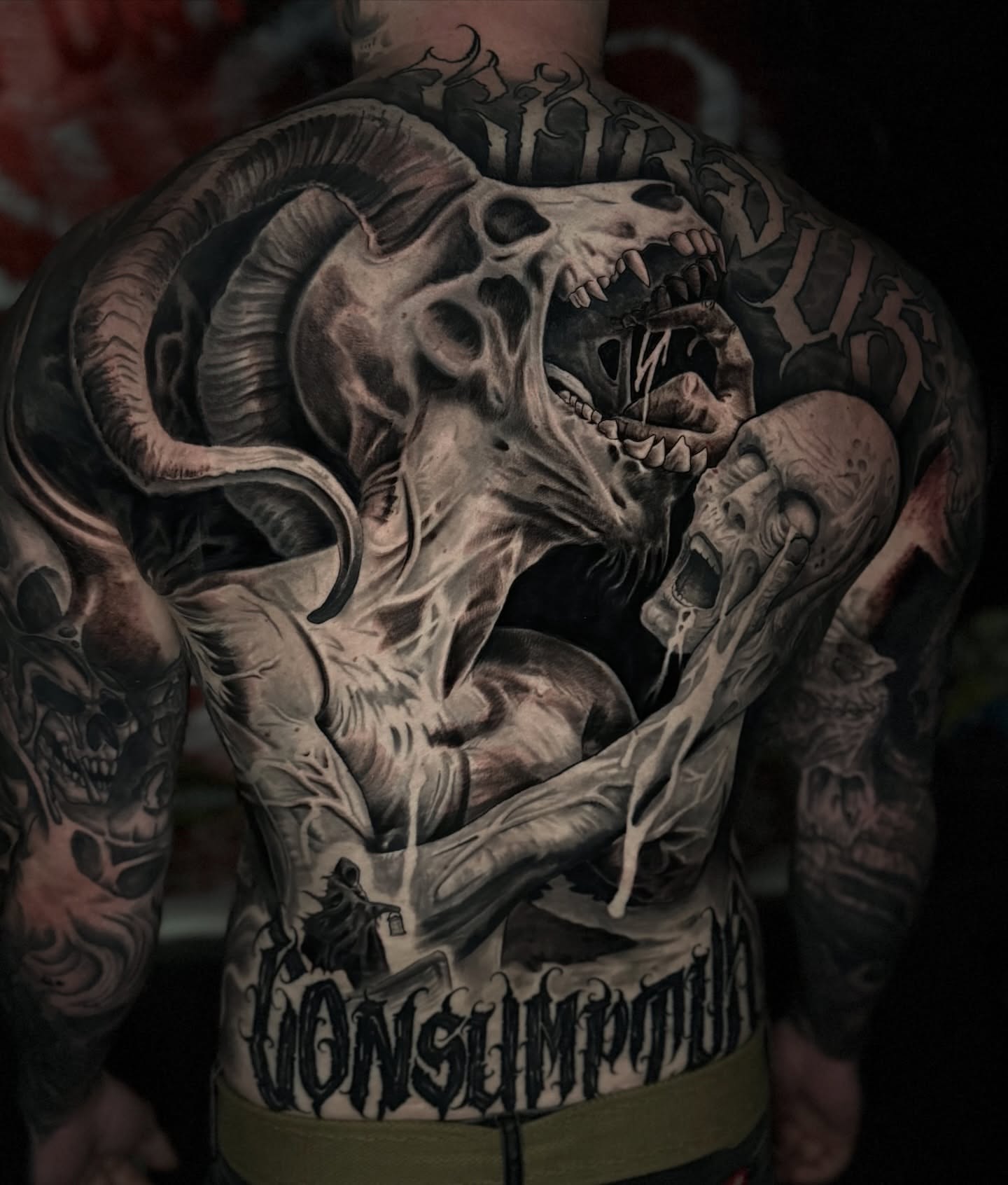 Demon skull dark realism tattoo on the back by Tucker, Maryville, Tennessee