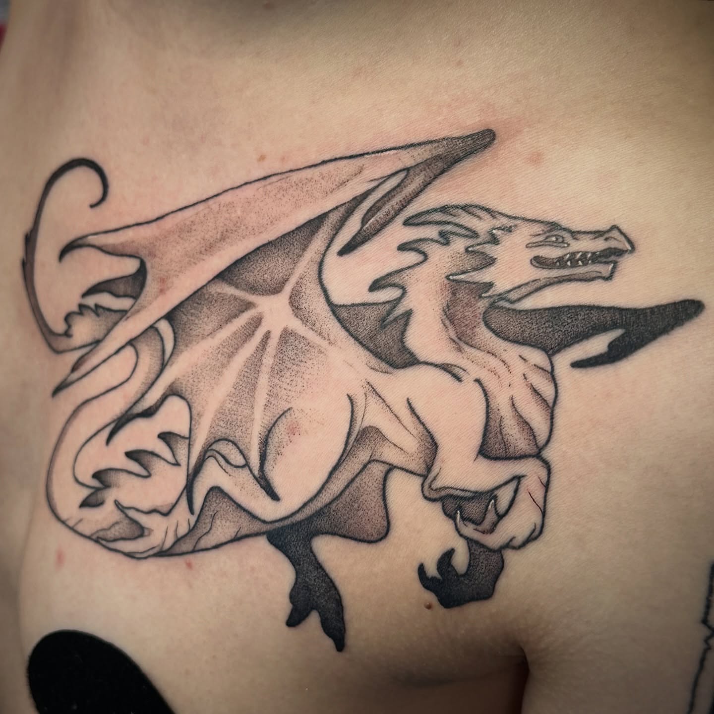 Dragon dotwork tattoo on the chest by TATTOOLIZARD (James)
