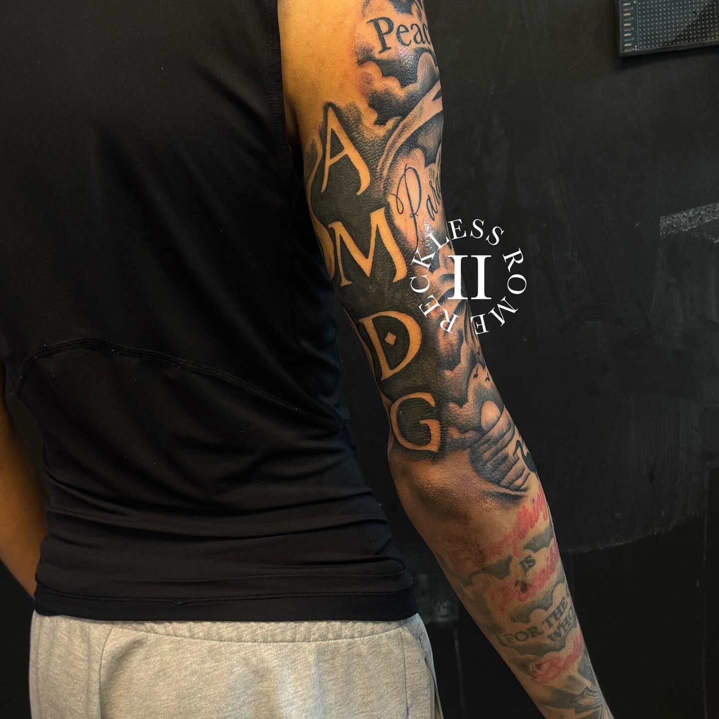 Script lettering lettering script tattoo on the forearm by Rome