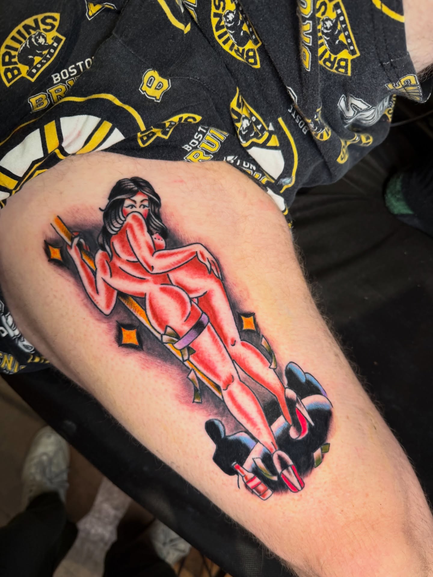 Pin-up girl American traditional tattoo on the thigh by πππ’π―π’π¨ πππΆπ©π¬π―π, Manchester, New Hampshire