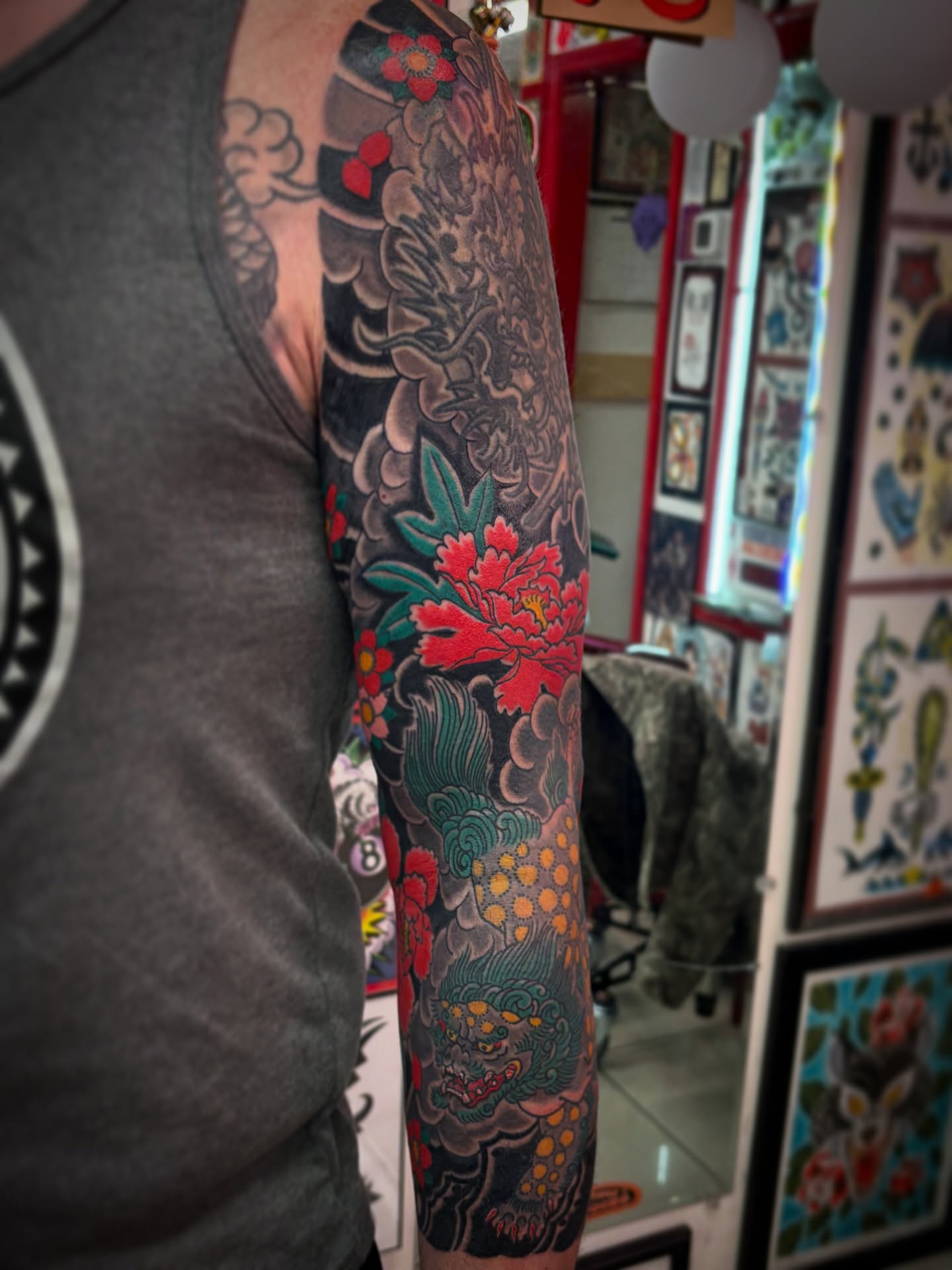 Peony and dragon japanese irezumi tattoo on the forearm by Carlos Gonzalez Tattoo, Dallas, Texas