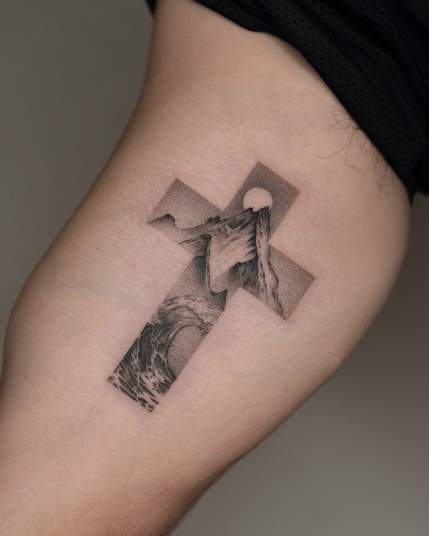 Cross with waterfall realism tattoo on the thigh by t y, t a t t o o a r t i s t