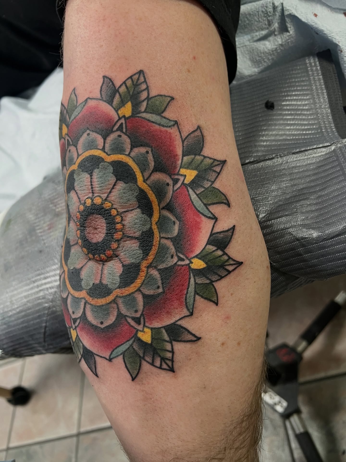 Floral bouquet American traditional tattoo on the forearm by Corey Thompson, Butler, Pennsylvania