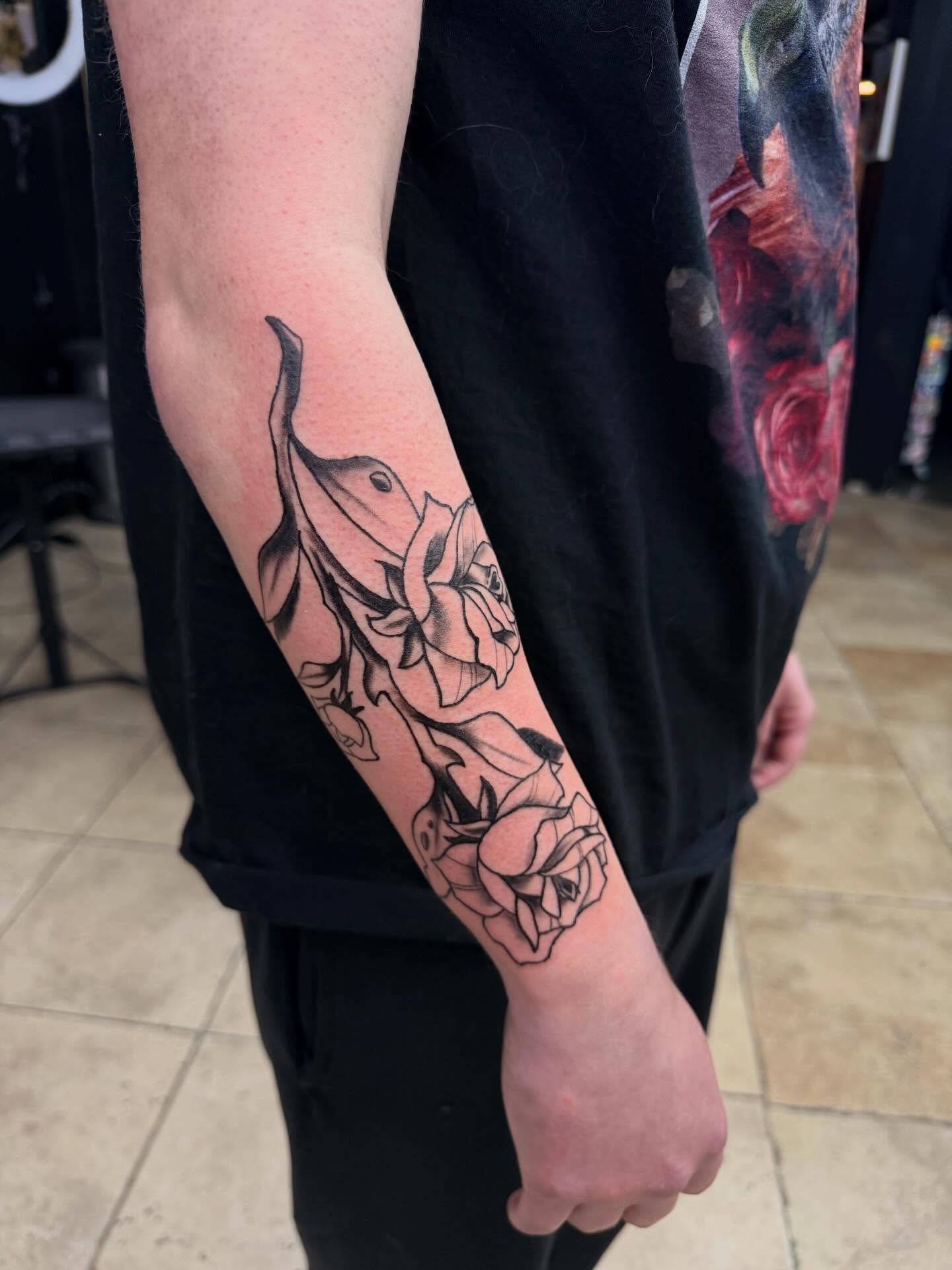 Roses black and grey tattoo on the forearm by Ellari