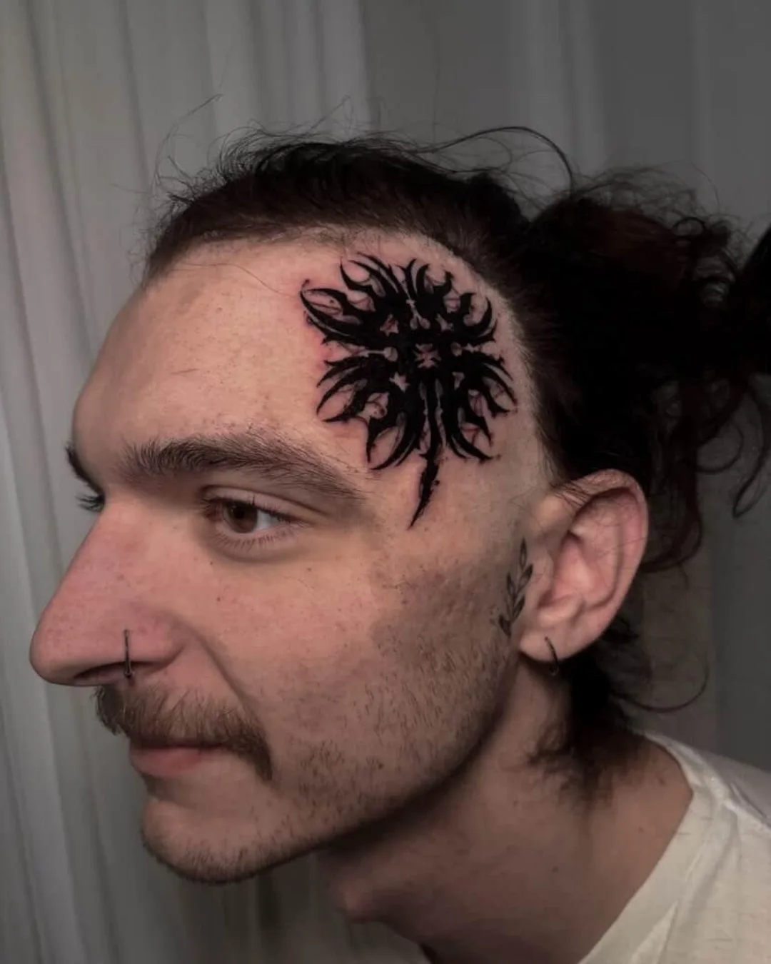 Floral design tribal tattoo on the head by Sal