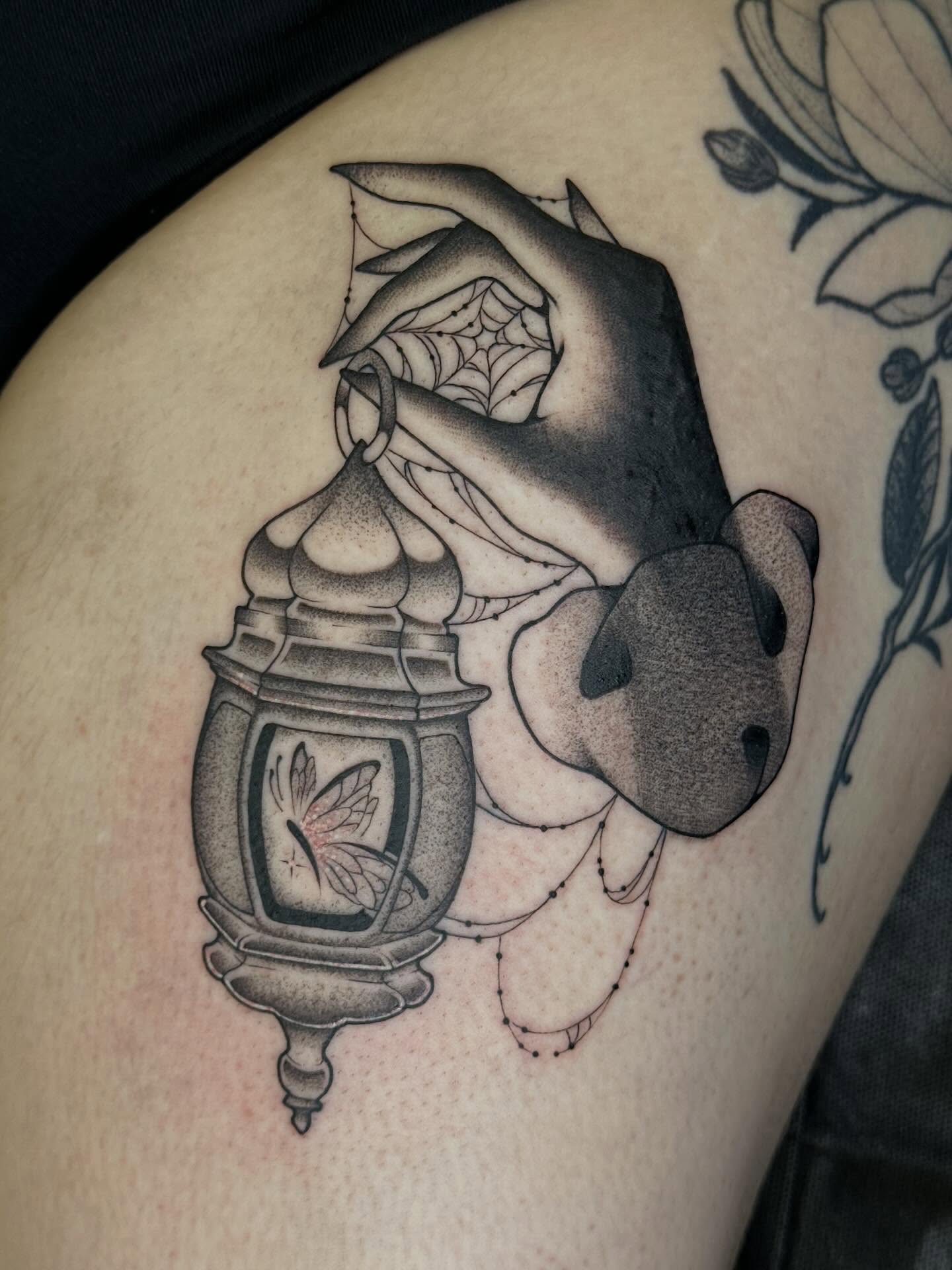 Lantern with butterfly realism tattoo on the thigh by 𝔅𝔞𝔱𝔅𝔬𝔫𝔢 🦇Mariah Hernandez