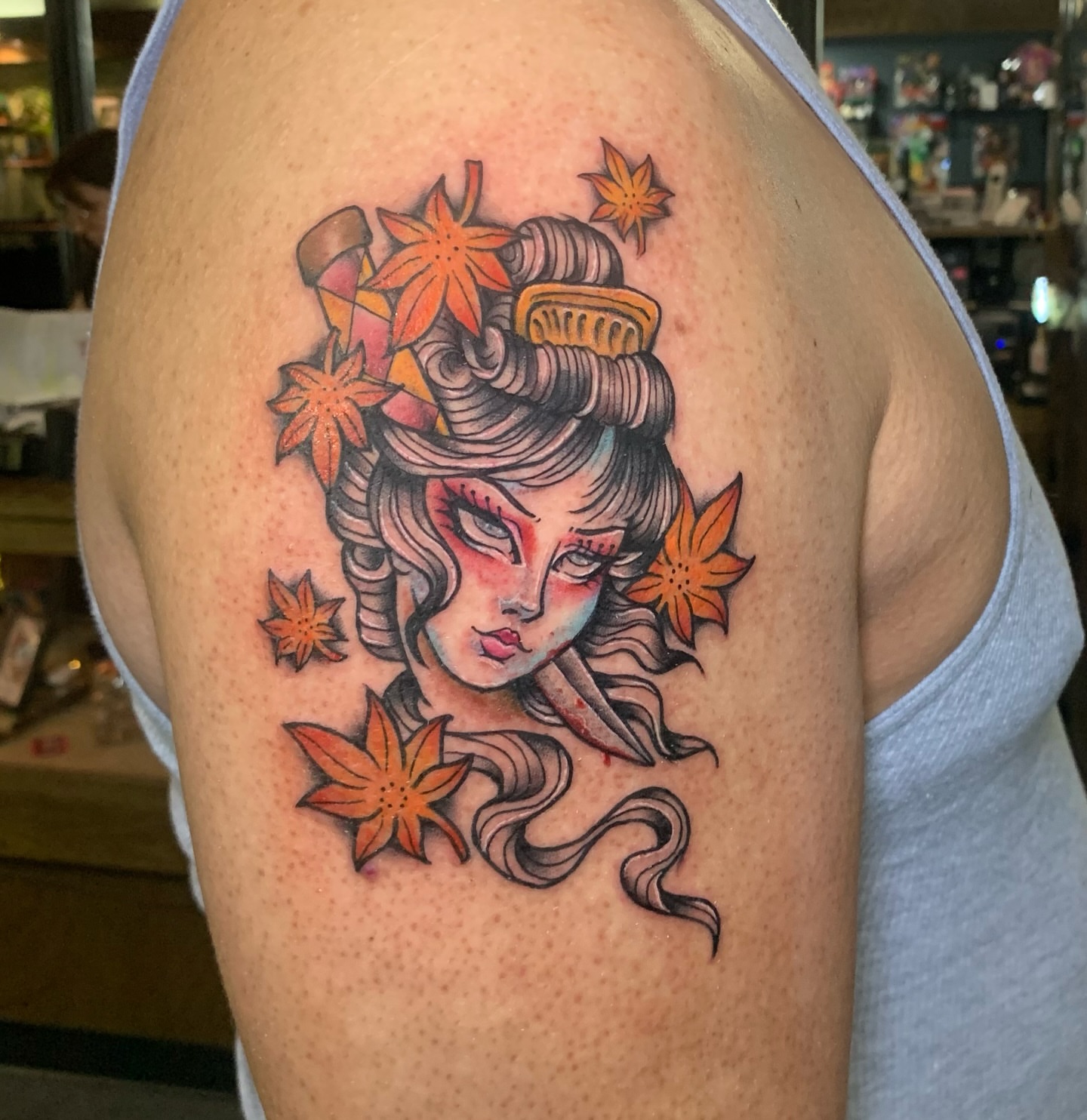 Geisha with flowers japanese irezumi tattoo on the shoulder by Aubrianna Grisez