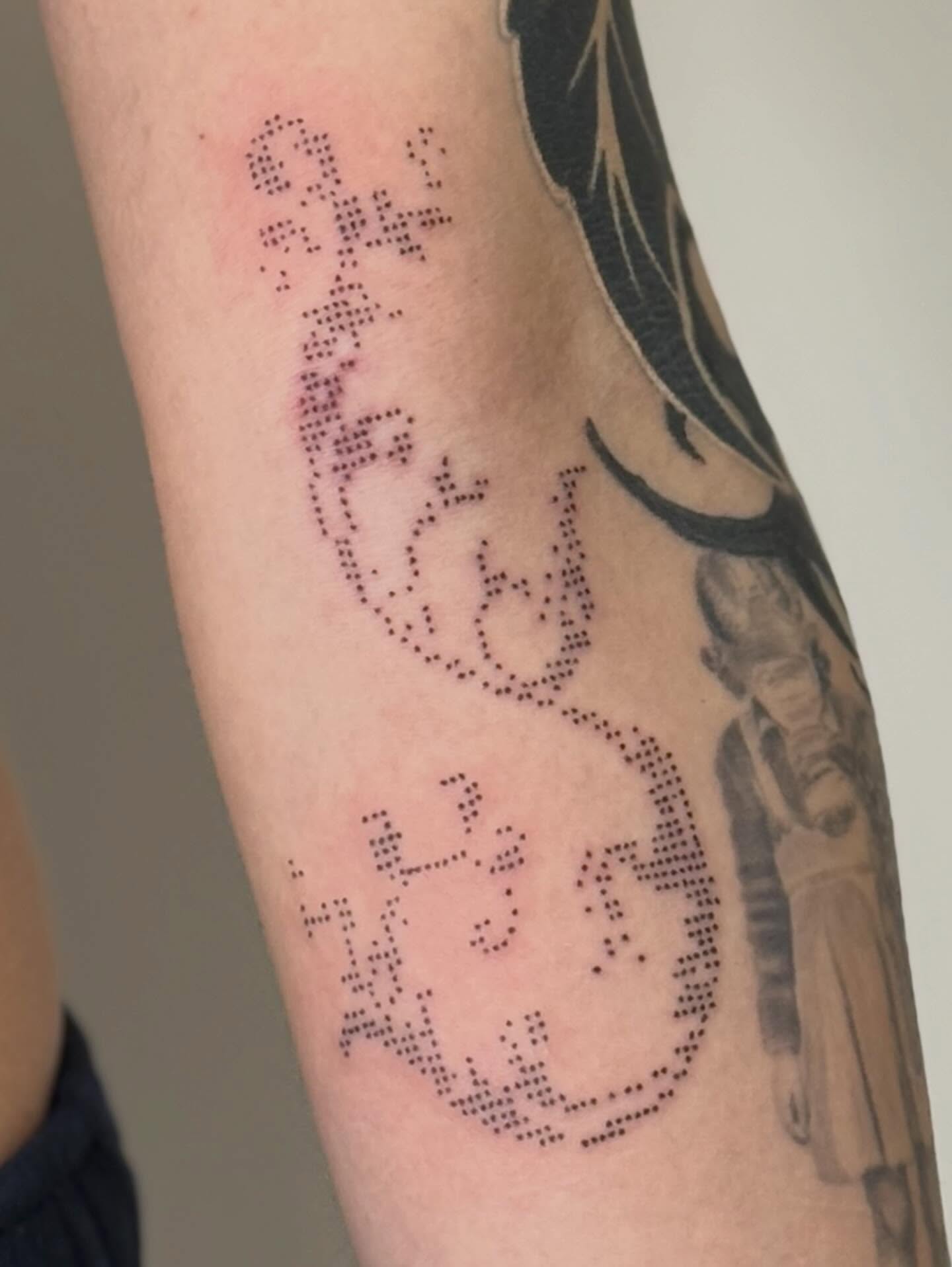 Dotwork dotwork tattoo on the forearm by Nevaeh tattoo artist