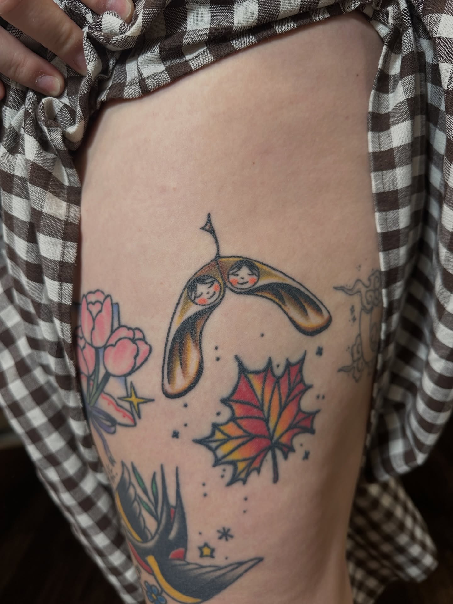 Bunny with children American traditional tattoo on the thigh by Hannah Eddy