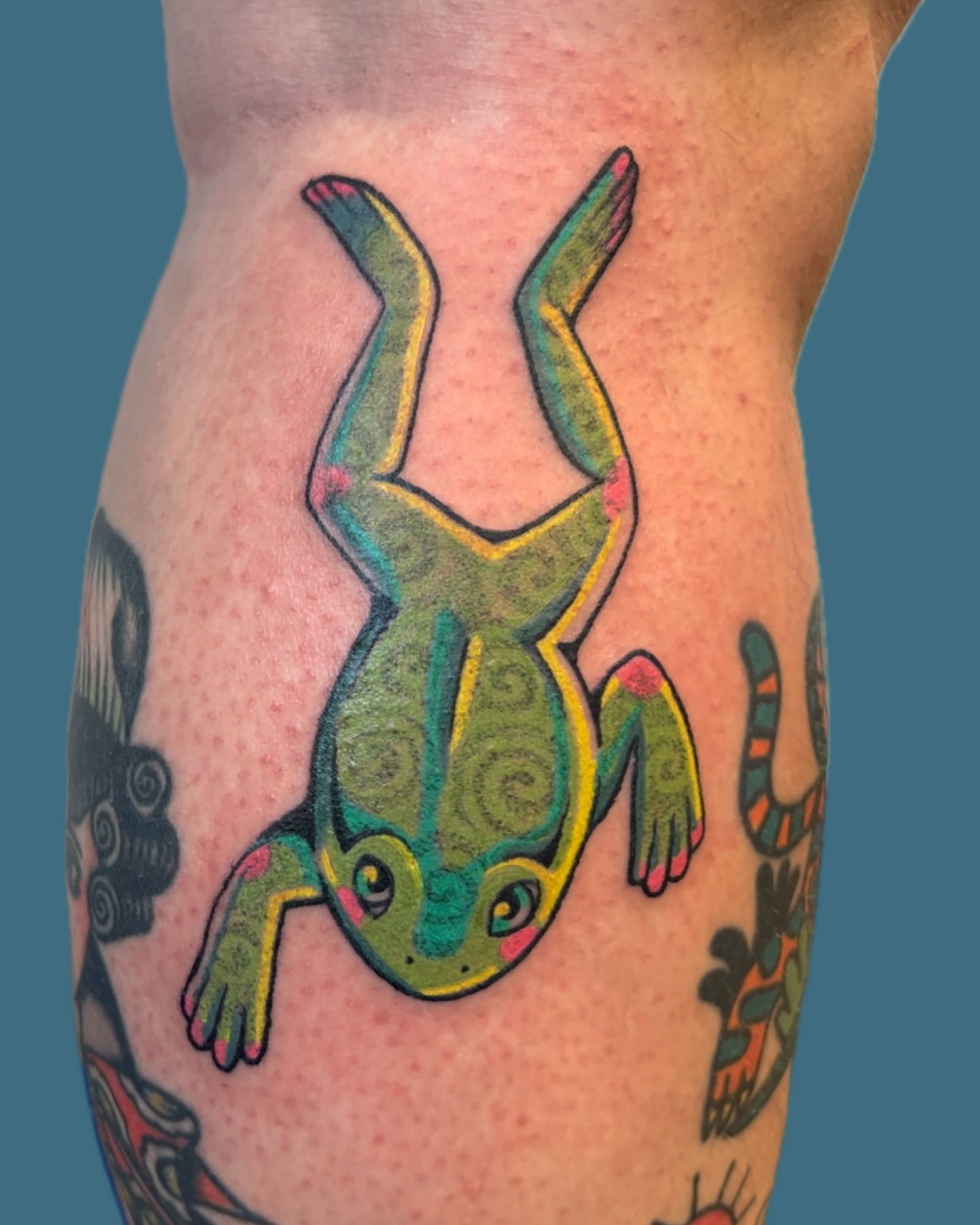 Frog American traditional tattoo on the thigh by rachel