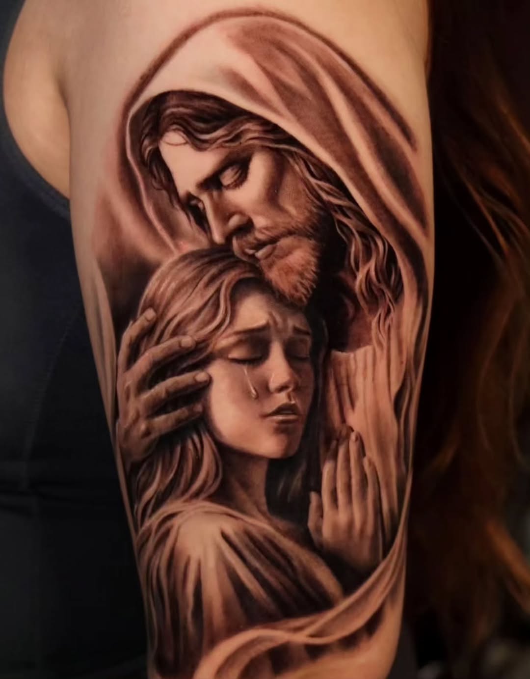 Jesus comforting a woman Chicano tattoo on the forearm by Brandon Rabago, Fort Worth, Texas
