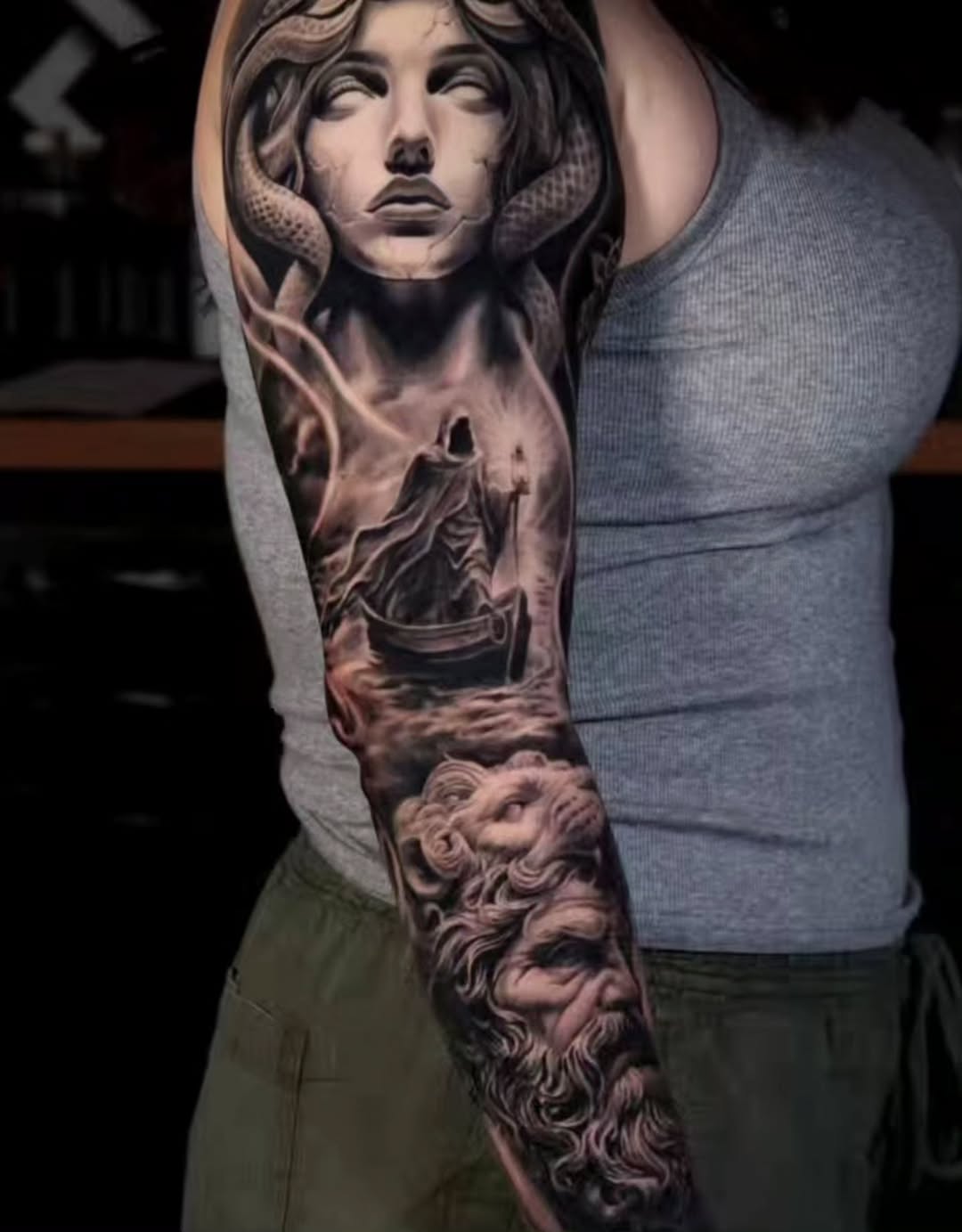 Medusa and Charon in a boat realism tattoo on the forearm by Brandon Rabago, Fort Worth, Texas