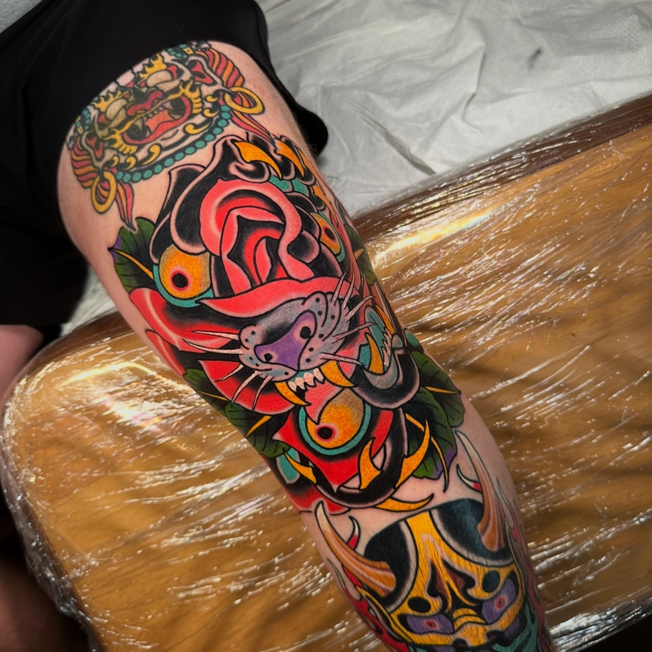 Tiger American traditional tattoo on the thigh by Schyler Ames, Canal Fulton, Ohio