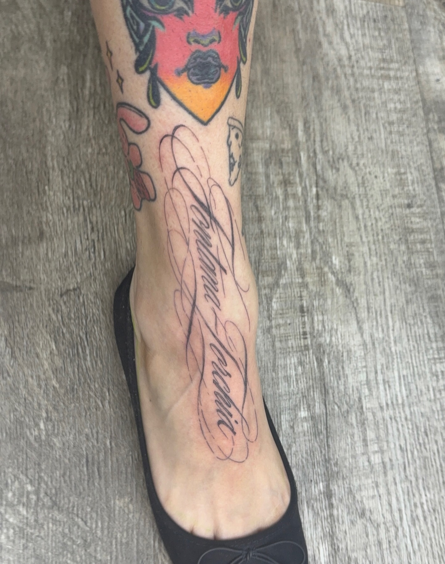Woman's face American traditional tattoo on the calf by ꧁༒