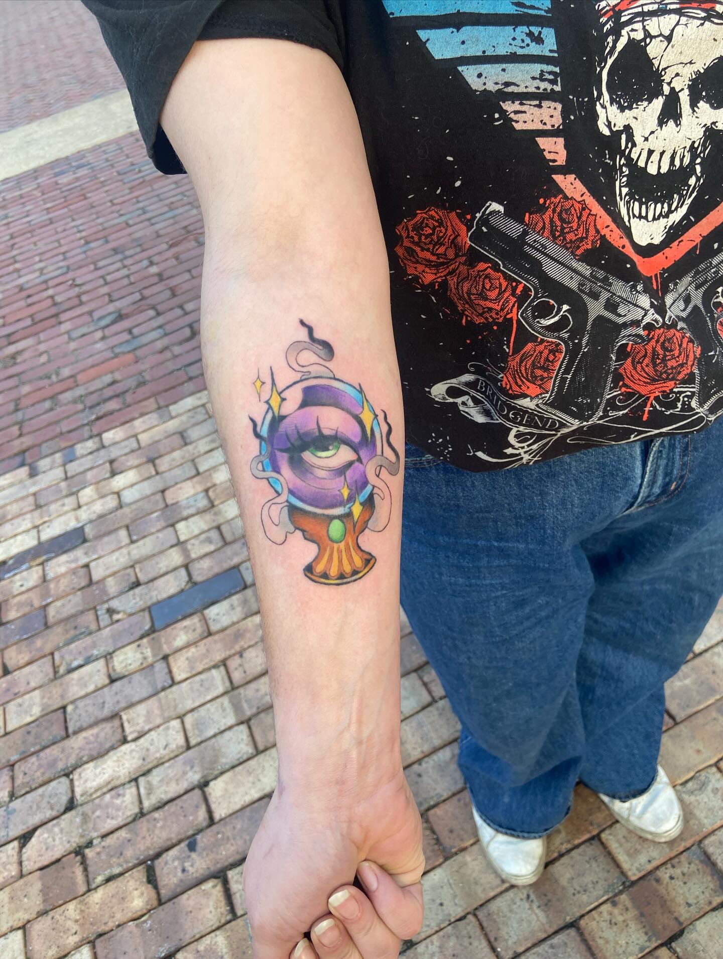 Eye with tentacles surrealism tattoo on the forearm by 🐆Cam Feral Tattoos
