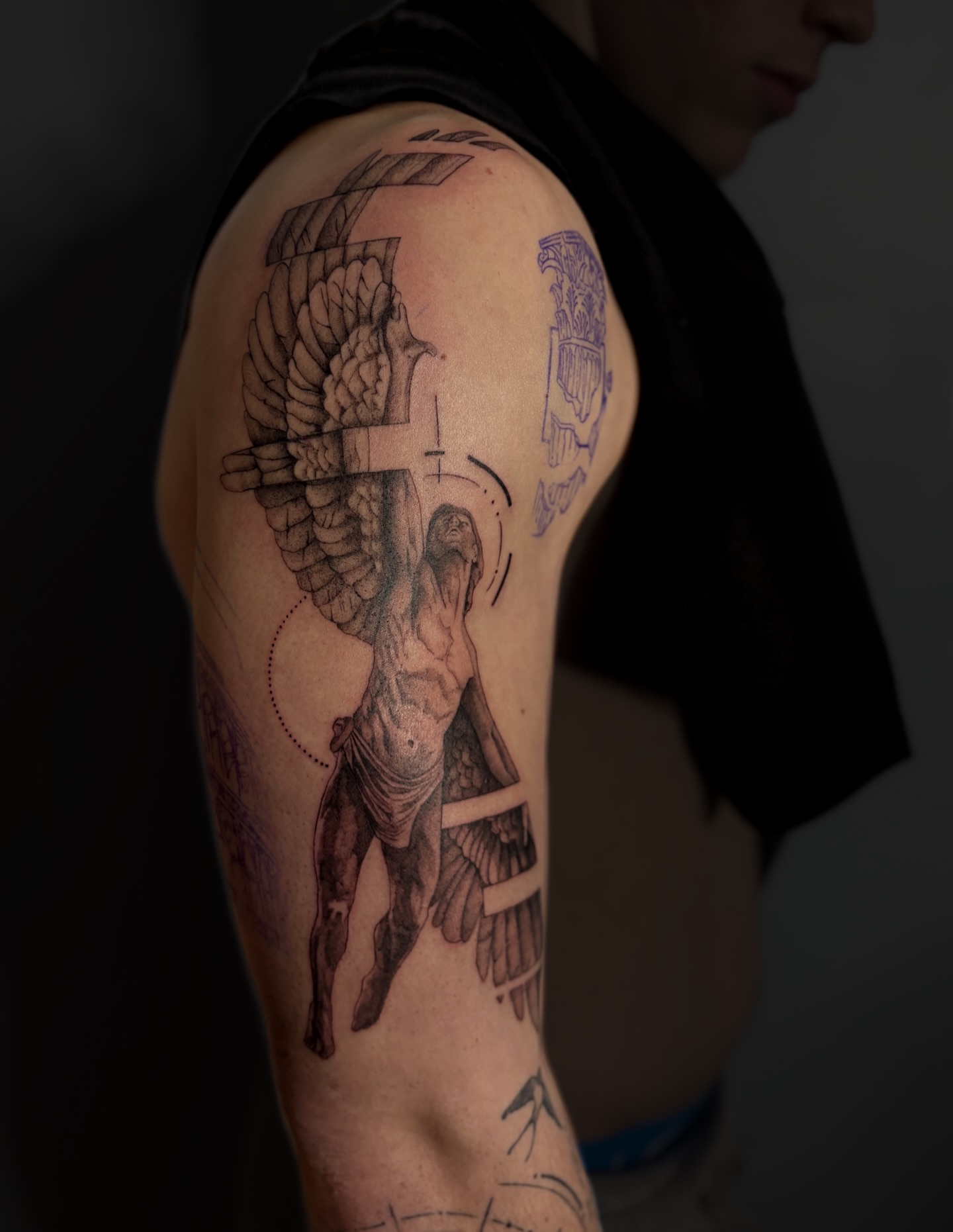 Angelic figure neo-traditional tattoo on the upper arm by Jessica McKinley Tattoo Artist