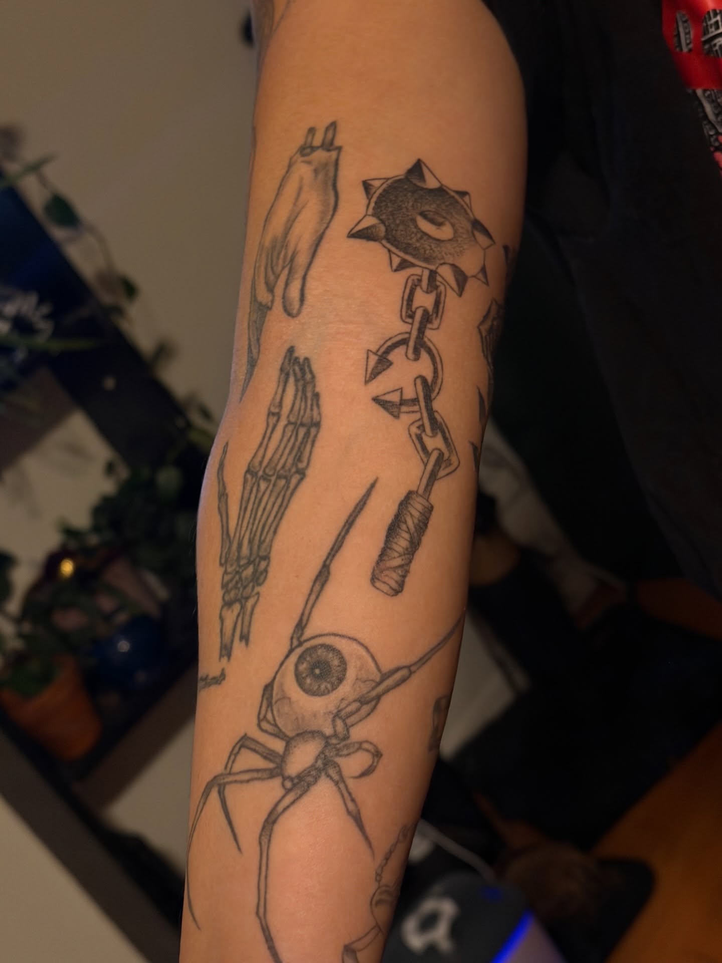 Surrealistic imagery surrealism tattoo on the forearm by Maddie Blosser, Portland, Oregon