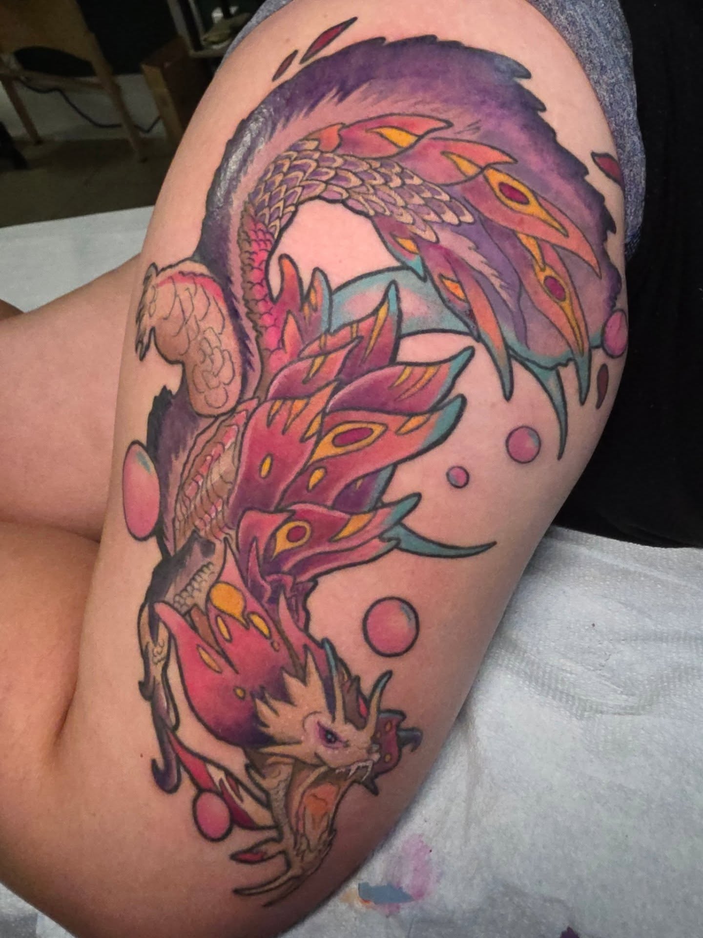 Dragon new school tattoo on the thigh by Kayla Williams
