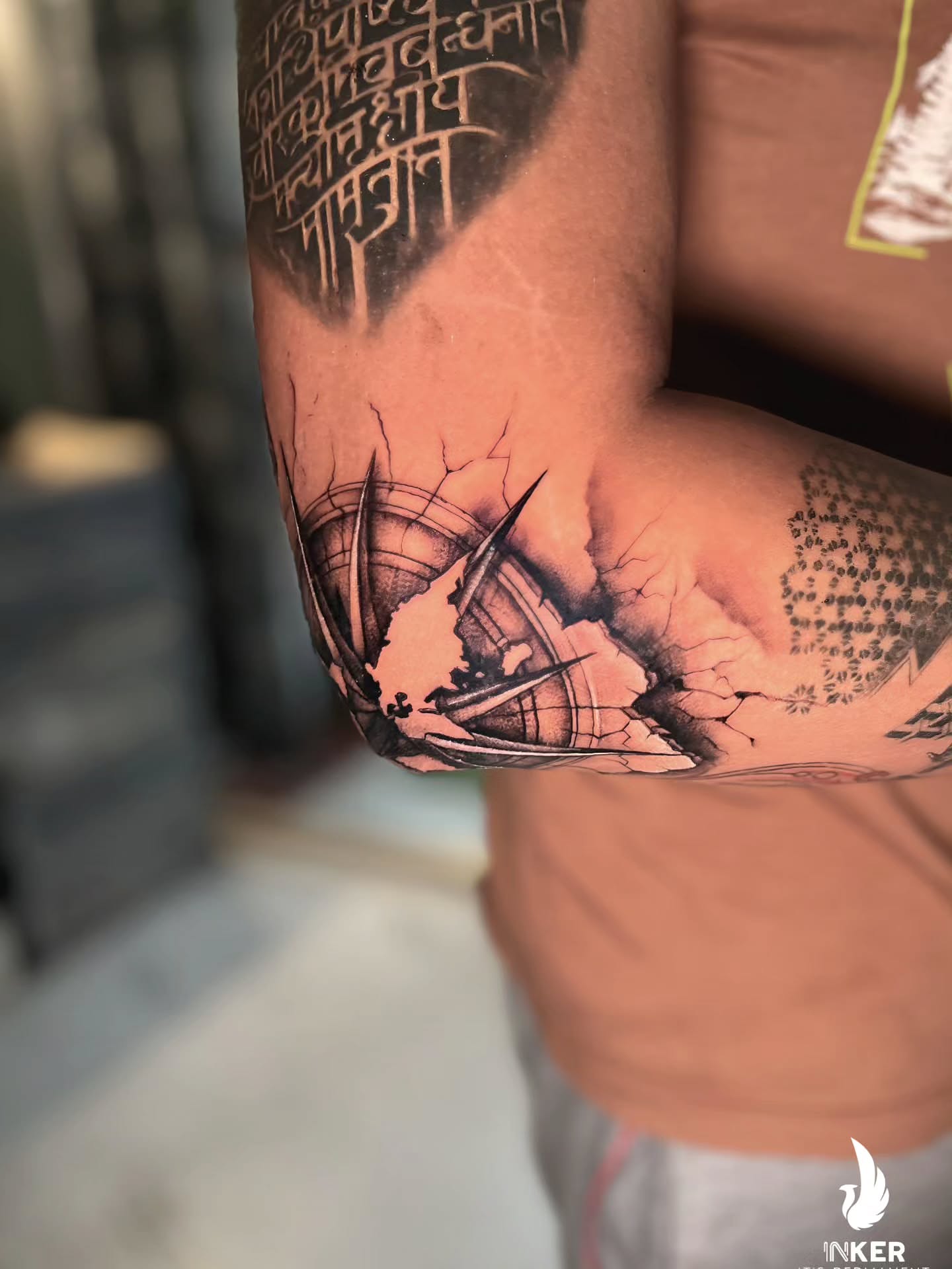 Ship breaking through wall realism tattoo on the forearm by Shubhadeep Mukherjee