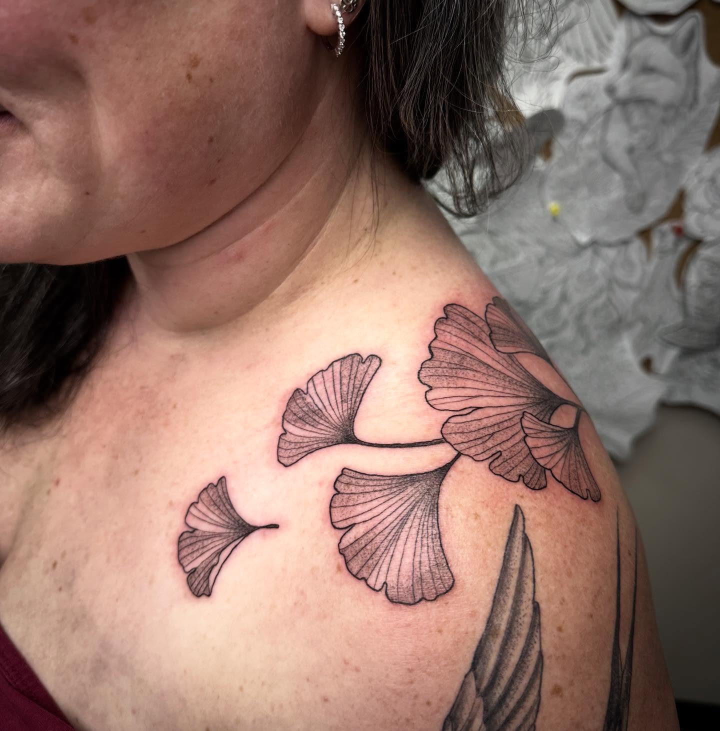 Gingko leaves black and grey tattoo on the shoulder by Heather Tattoos Danvers MA