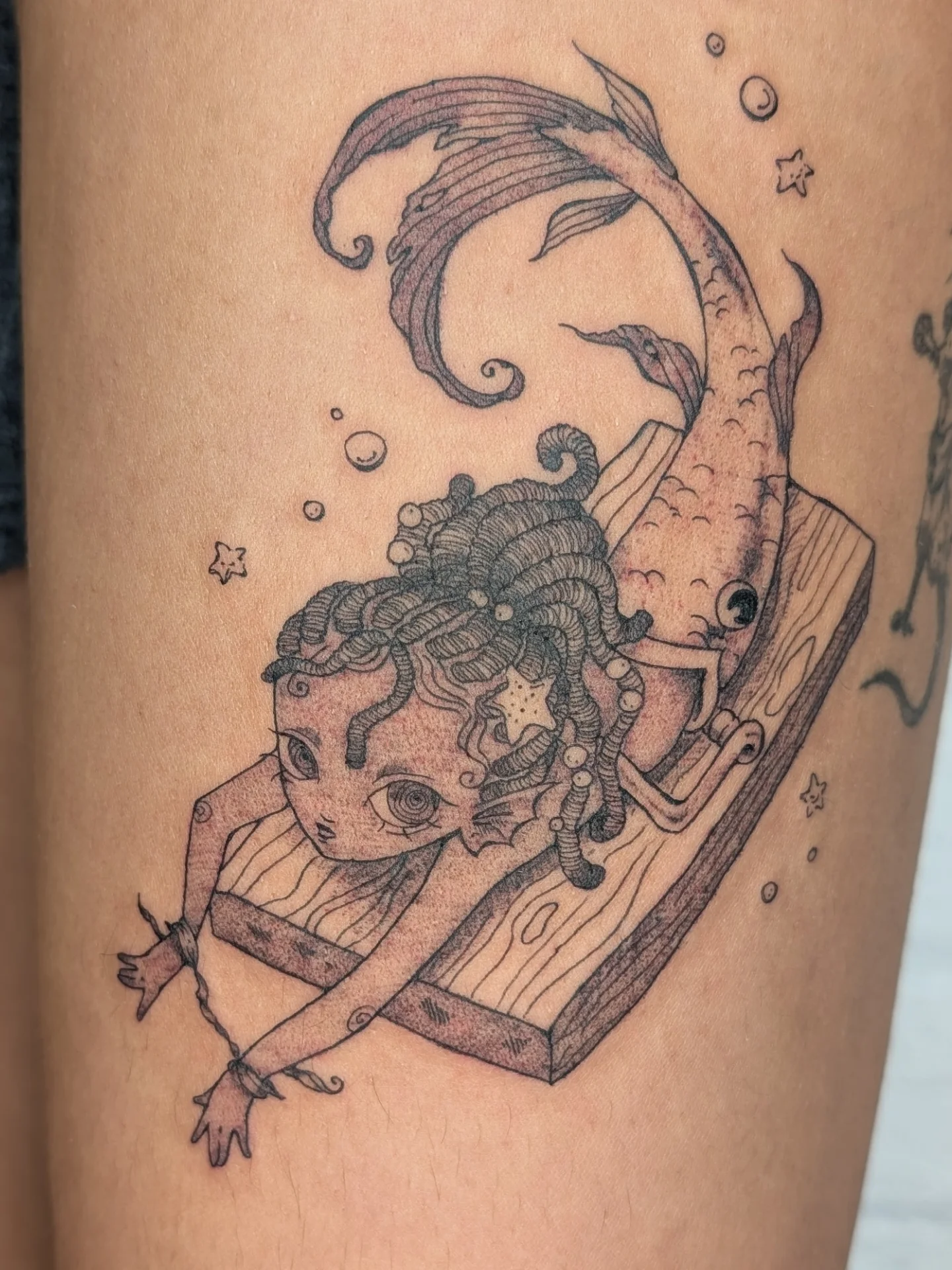 Mermaid dotwork tattoo on the thigh by mila