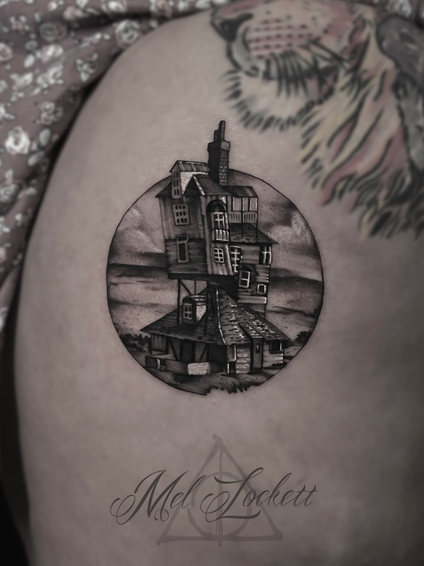 House black and grey tattoo on the thigh by Mel K Lockett - Nashville Tattoo Artist