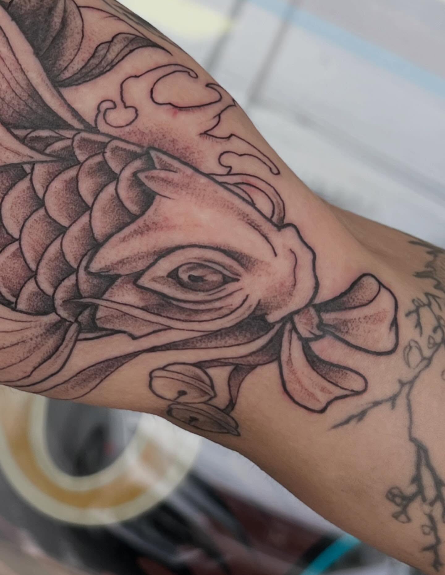 Koi fish black and grey tattoo on the forearm by Callie πͺ