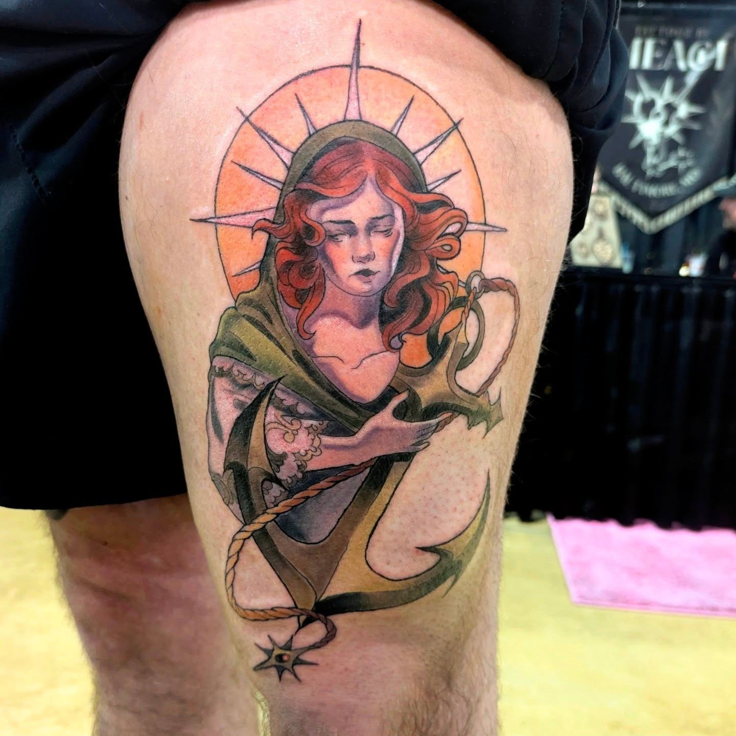 Woman with bow illustrative tattoo on the thigh by Lahel (Lay-el) Fowler