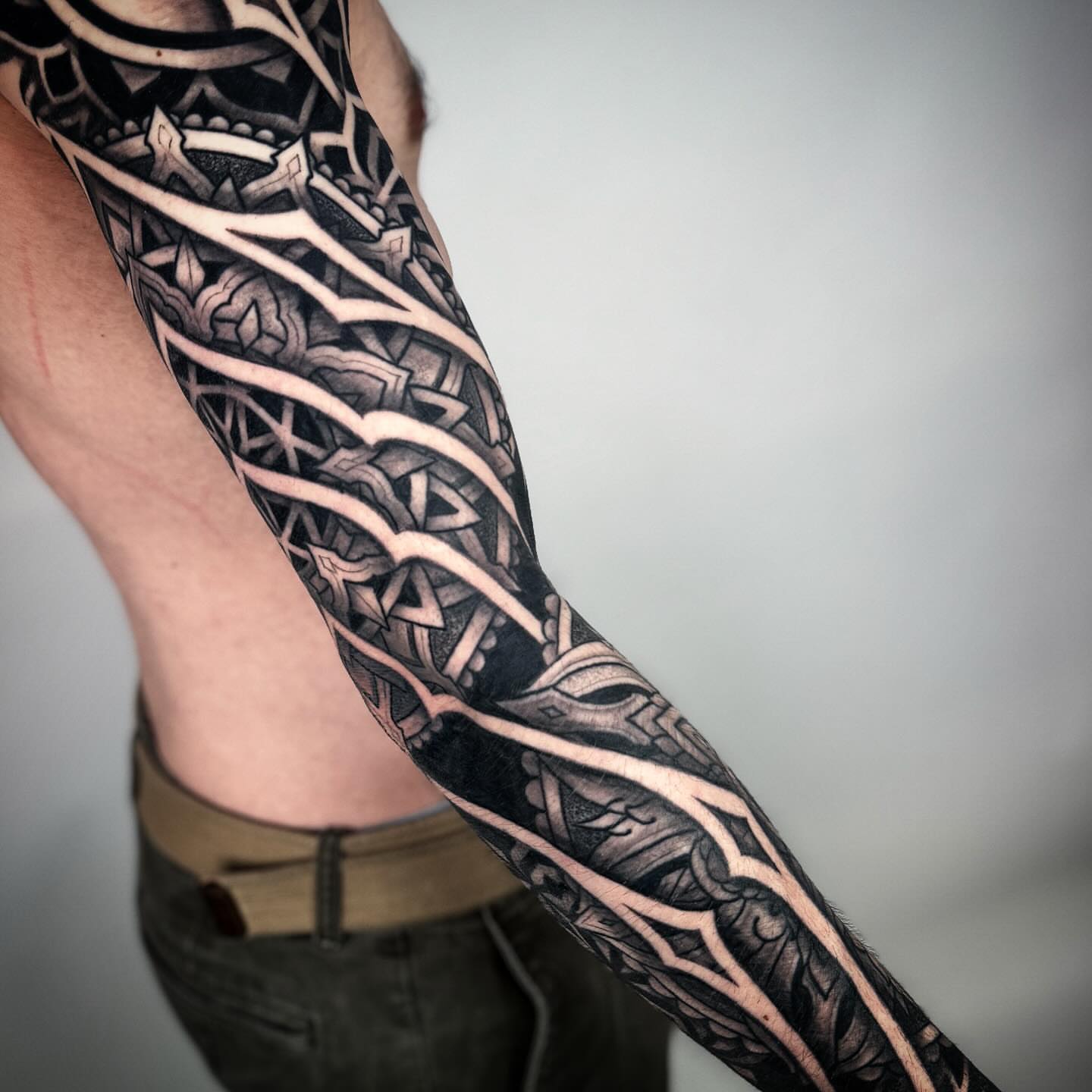 Geometric pattern geometric tattoo on the forearm by Aries Rhysing, Wheat Ridge, Colorado