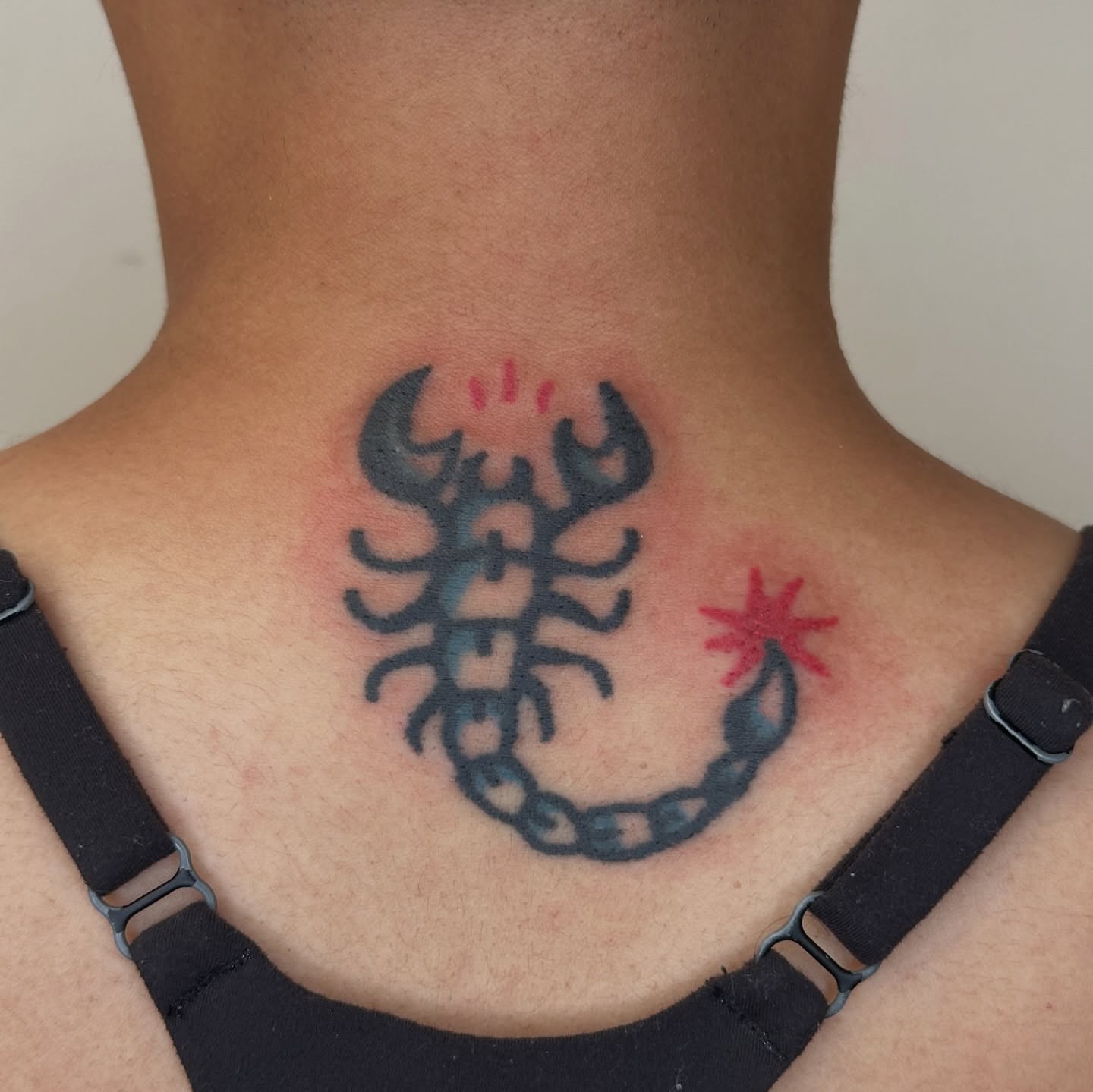 Scorpion geometric tattoo on the neck by paulina