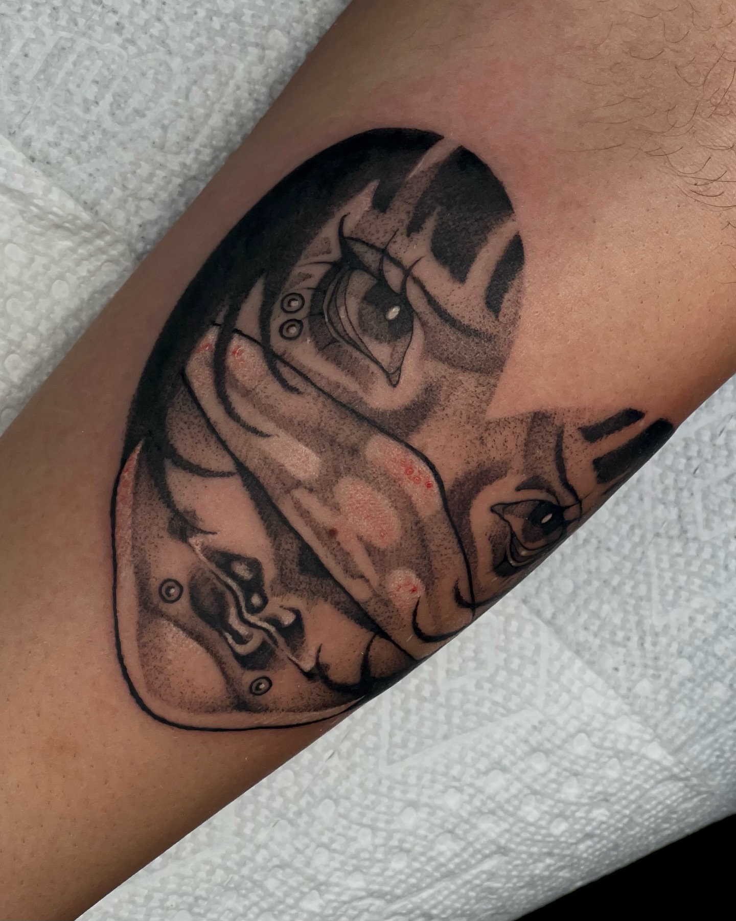 Abstract face realism tattoo on the forearm by ty ☆ nbtx tattoo artist