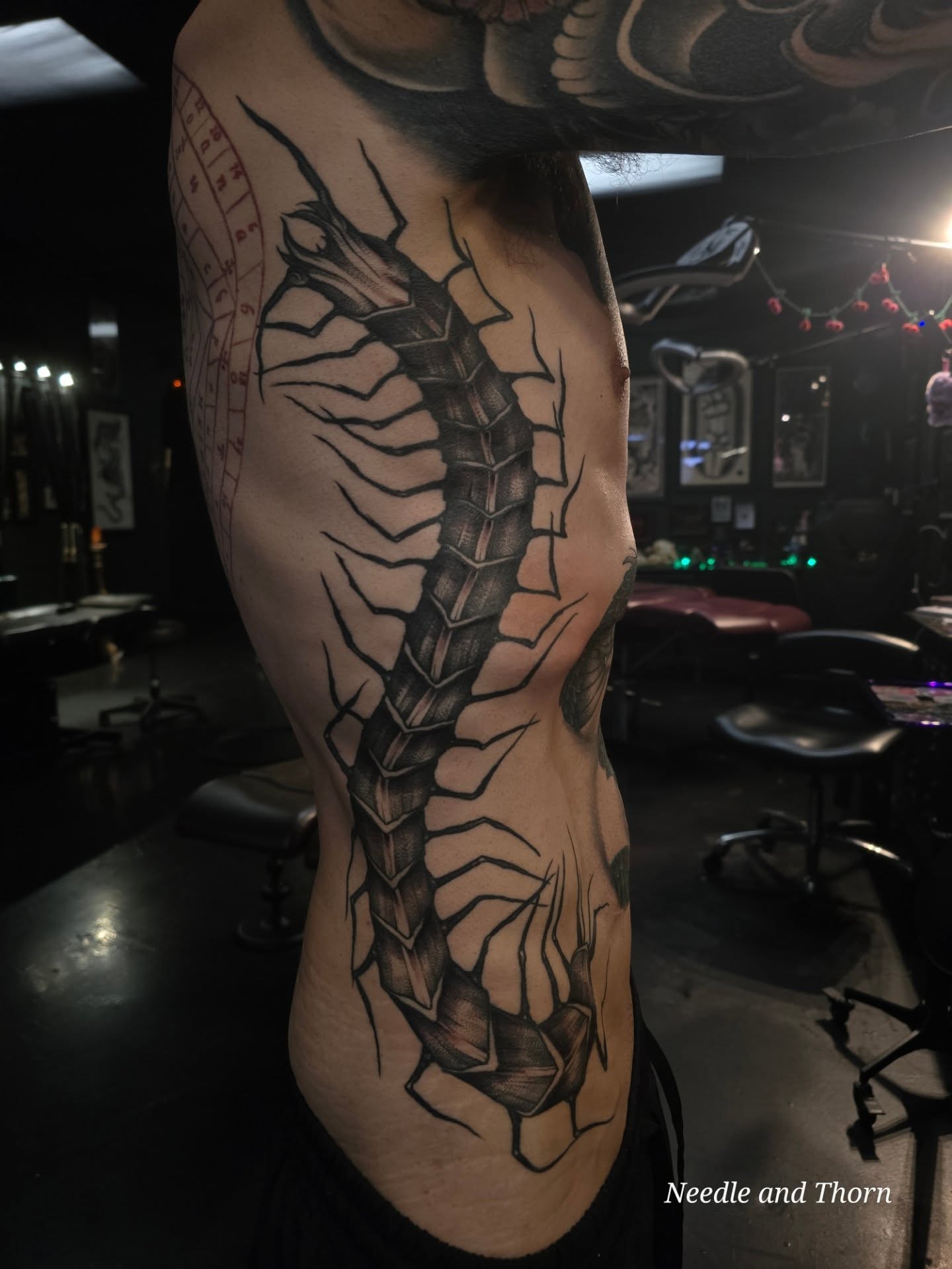 Tattoo by @needleandthorntattoo — black_and_grey, geometric