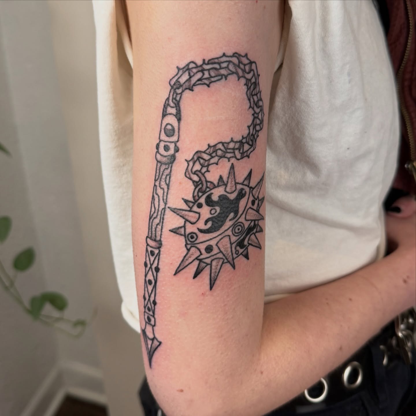 Chainmail weapon black and grey tattoo on the forearm by Ash Nicola, Asheville, North Carolina