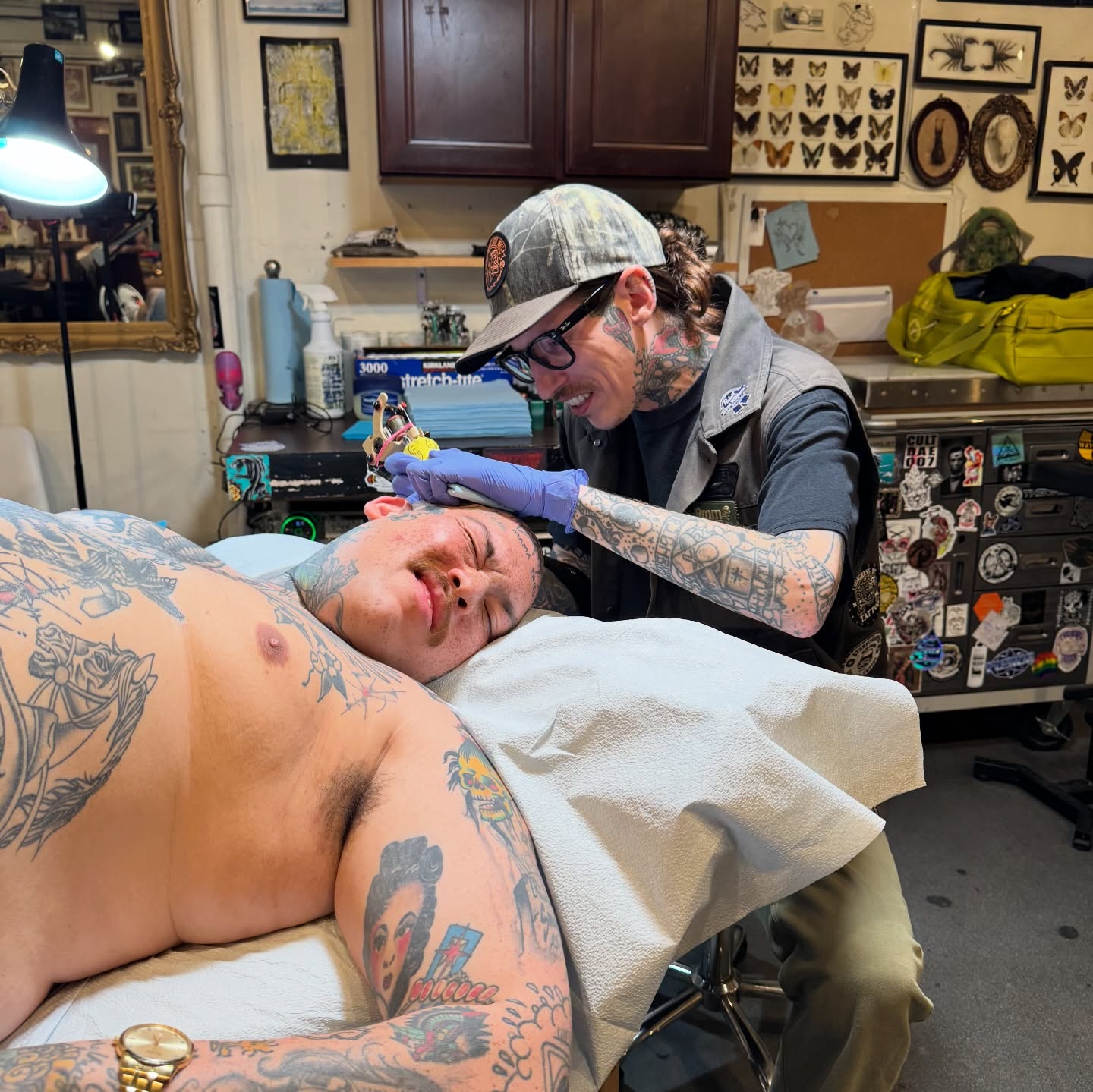 Man with tattoos American traditional tattoo on the chest by Anthony Tattooer, Seattle, Washington