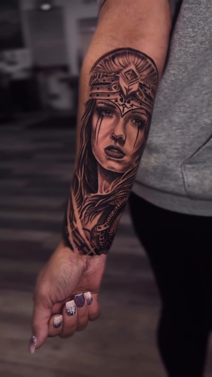 Woman with crown realism tattoo by Miguel Garcia