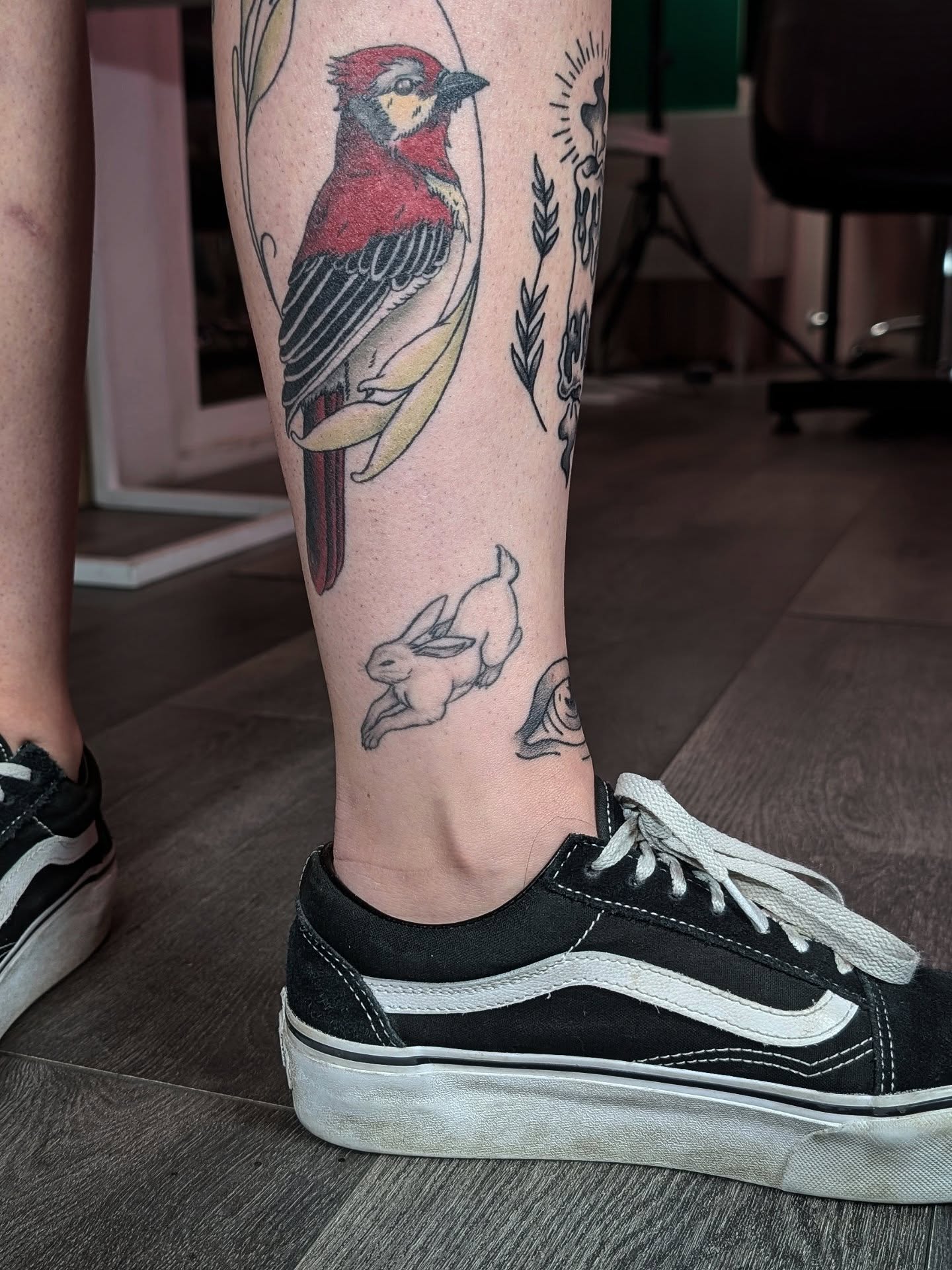 Bird and rabbit American traditional tattoo on the calf by ᴇʟɪsᴇ