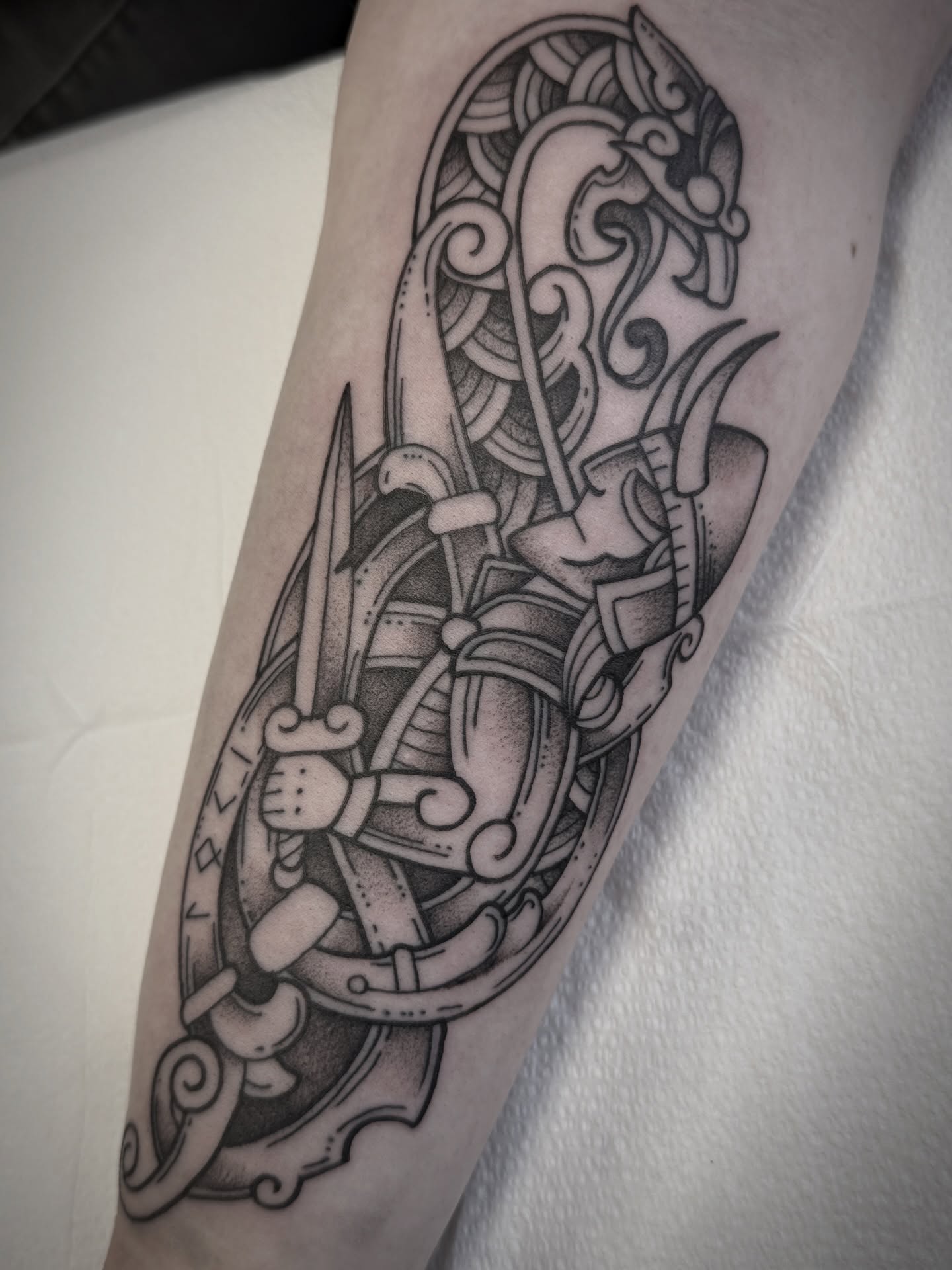 Viking warrior geometric tattoo on the forearm by Jeremy Utley