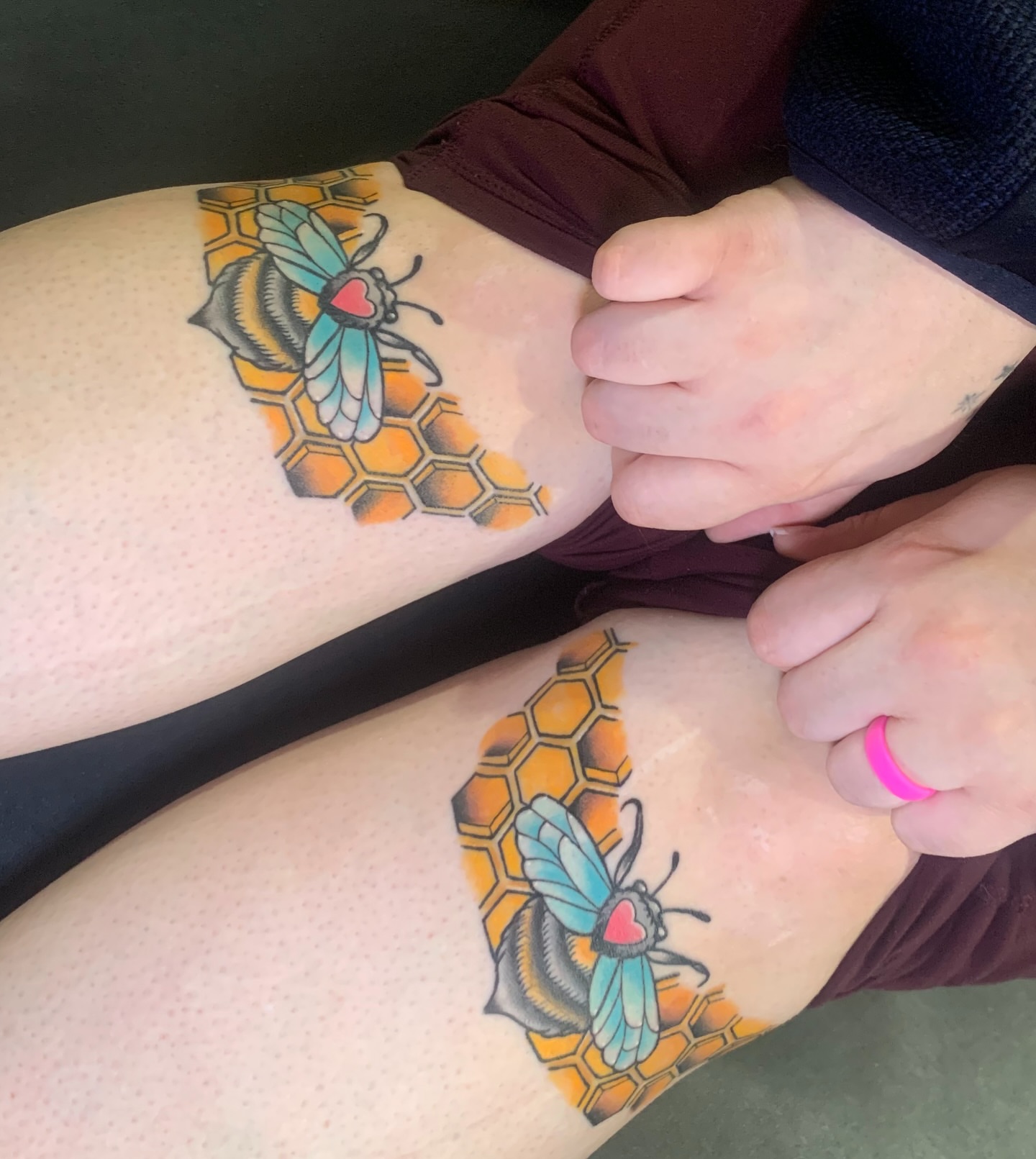 Bee and honeycomb American traditional tattoo on the forearm by Aubrianna Grisez
