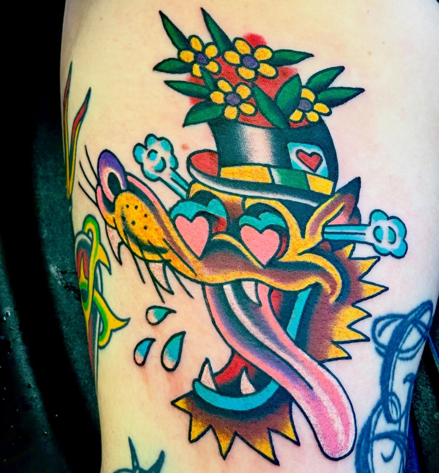 Cat with top hat American traditional tattoo on the thigh by Sam Hambrick, Watchung NJ