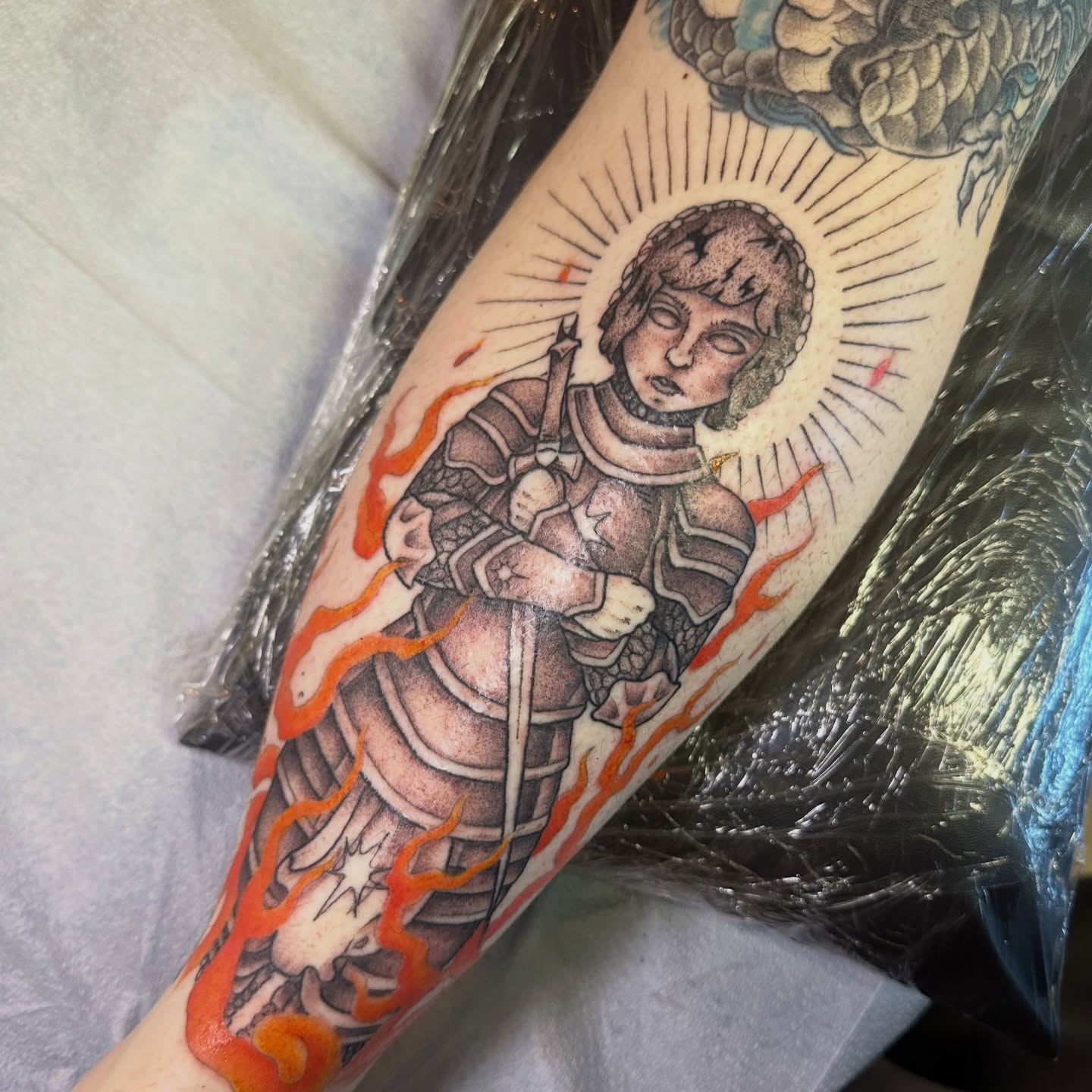 Saint in armor American traditional tattoo on the forearm by Luisa Gonzalez, Austin, Texas
