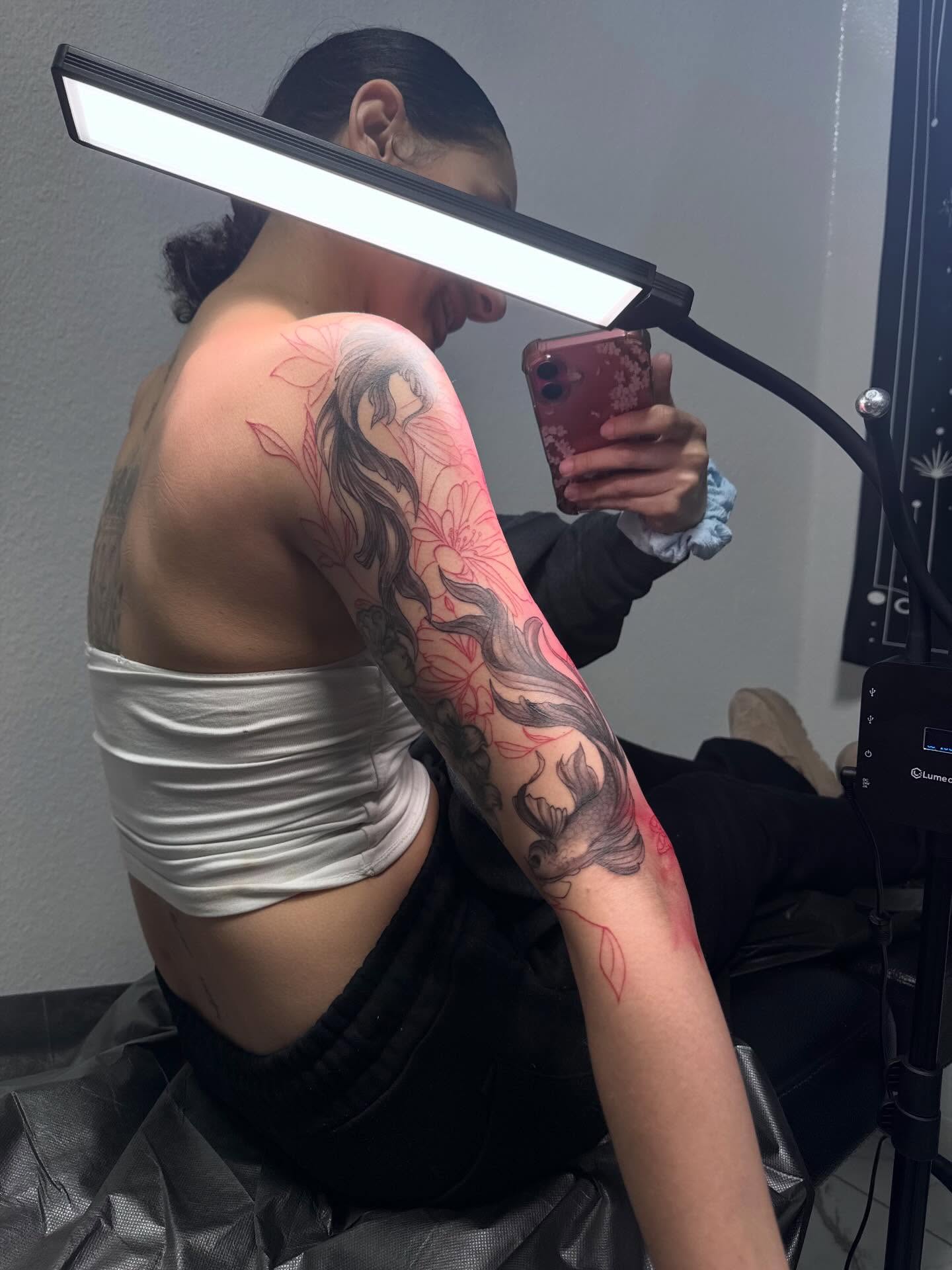 Floral woman American traditional tattoo on the upper arm by Idalia Pulido