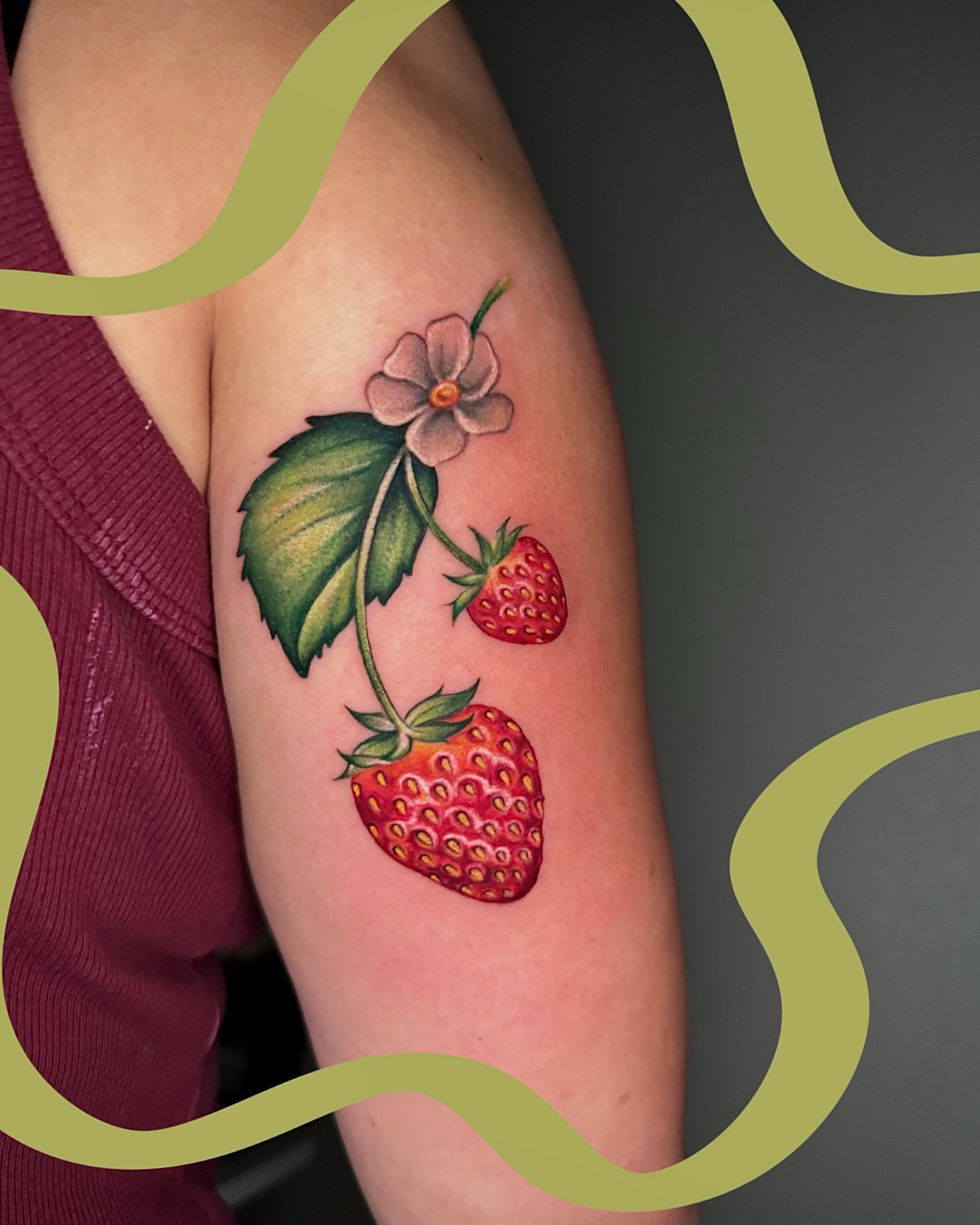 Strawberries and flower realism tattoo on the forearm by Nichole Lorence
