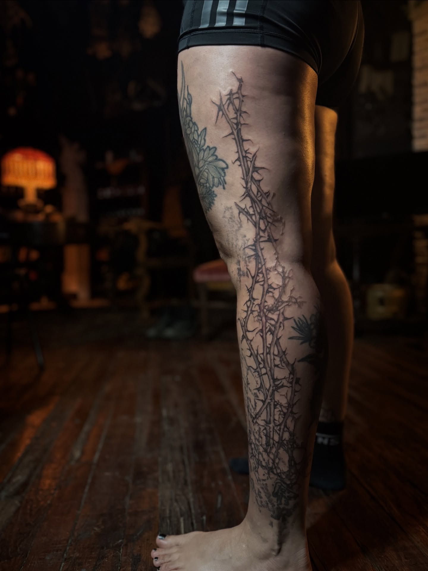 Thorn bush black and grey tattoo on the calf by Jamie Draven 🐺