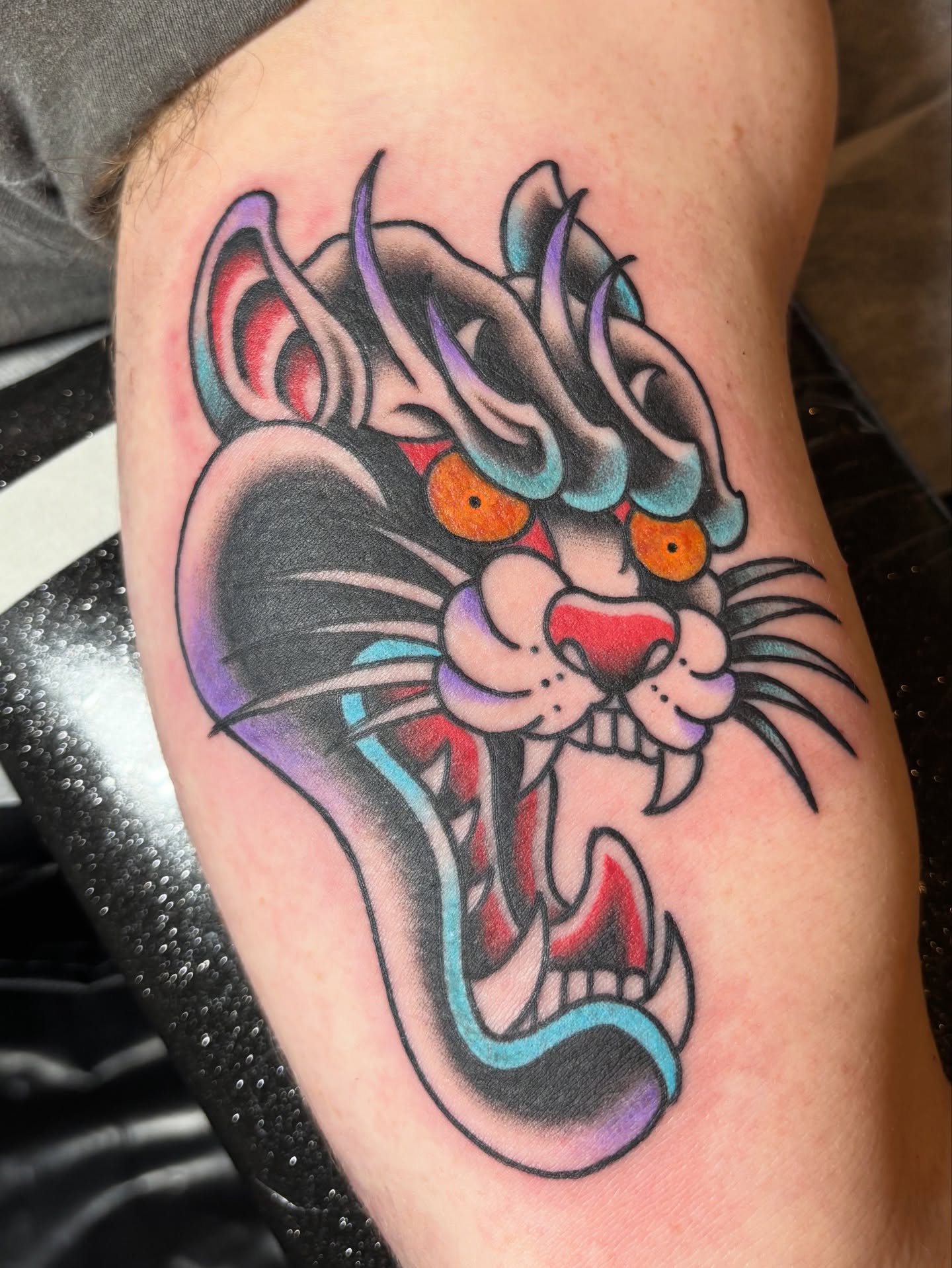 Panther American traditional tattoo on the thigh by @koma_tk