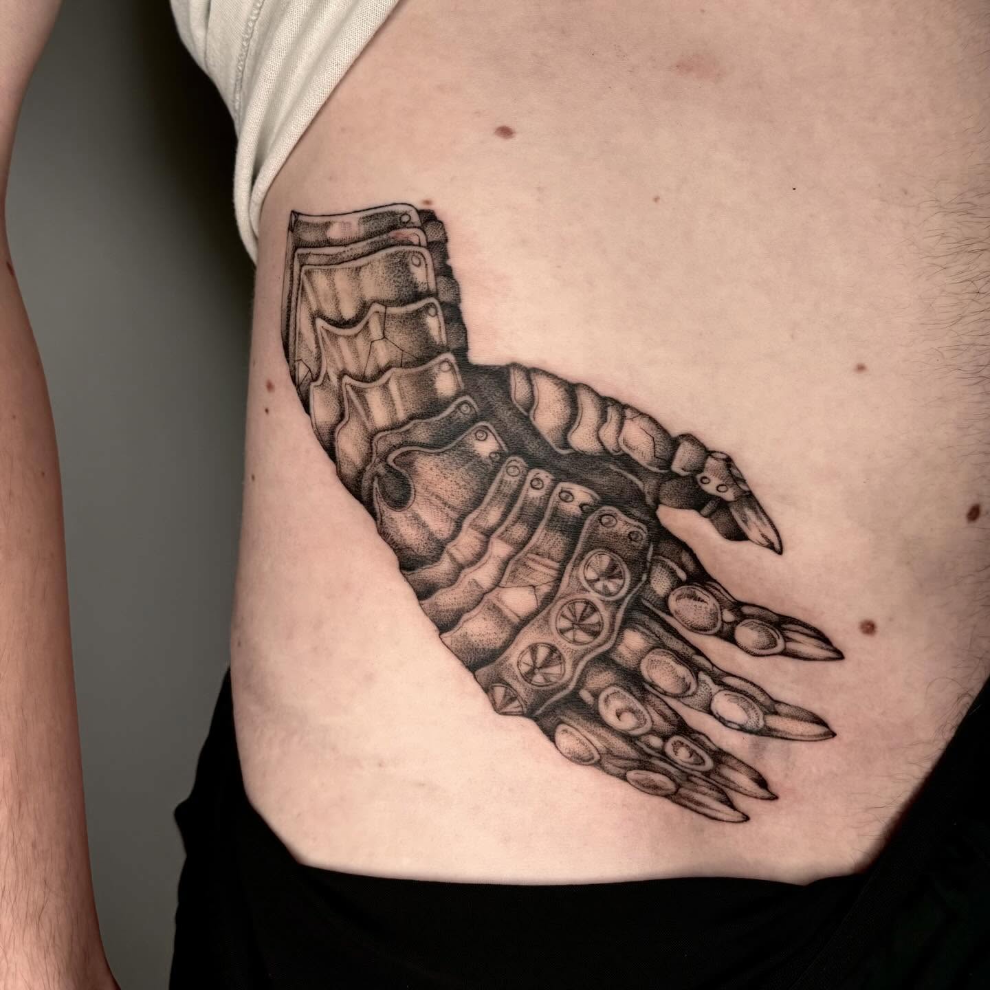 Mech hand geometric tattoo by taline