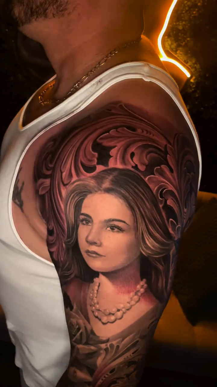 Tattoo by @jorgerosales_tattoos — realism, black_and_grey
