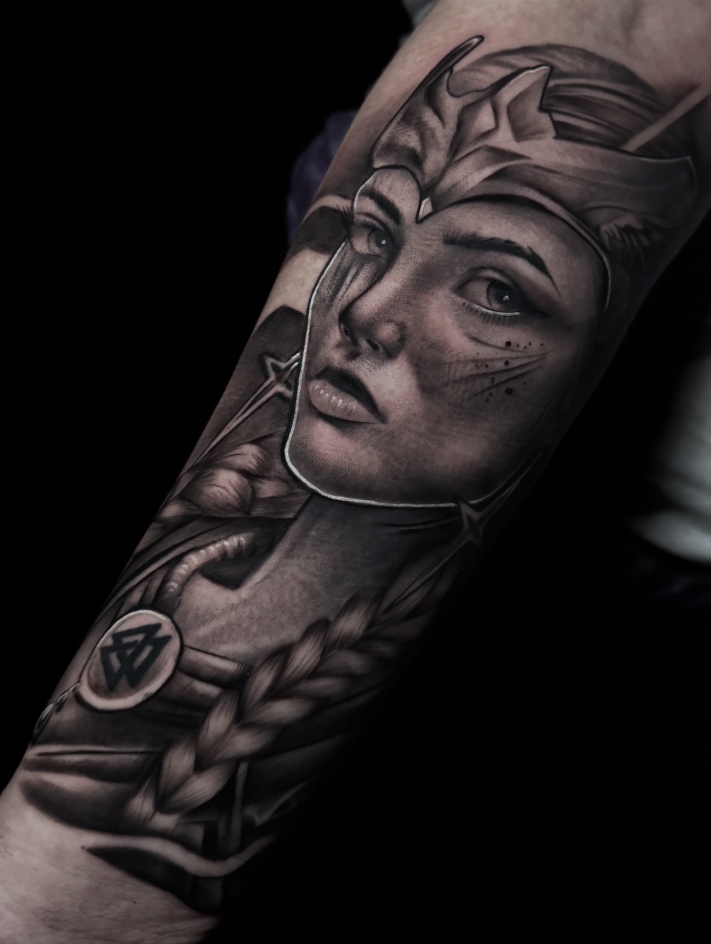 Woman's face realism tattoo on the forearm by Jaxx Kesler