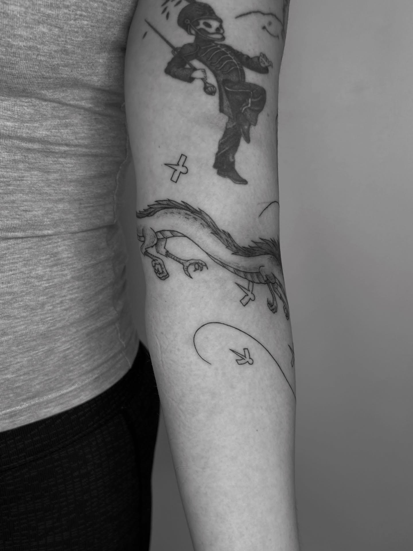 Skeleton and dragon black and grey tattoo on the forearm by ☆ Nashville Fine Line Tattoo Artist ☆