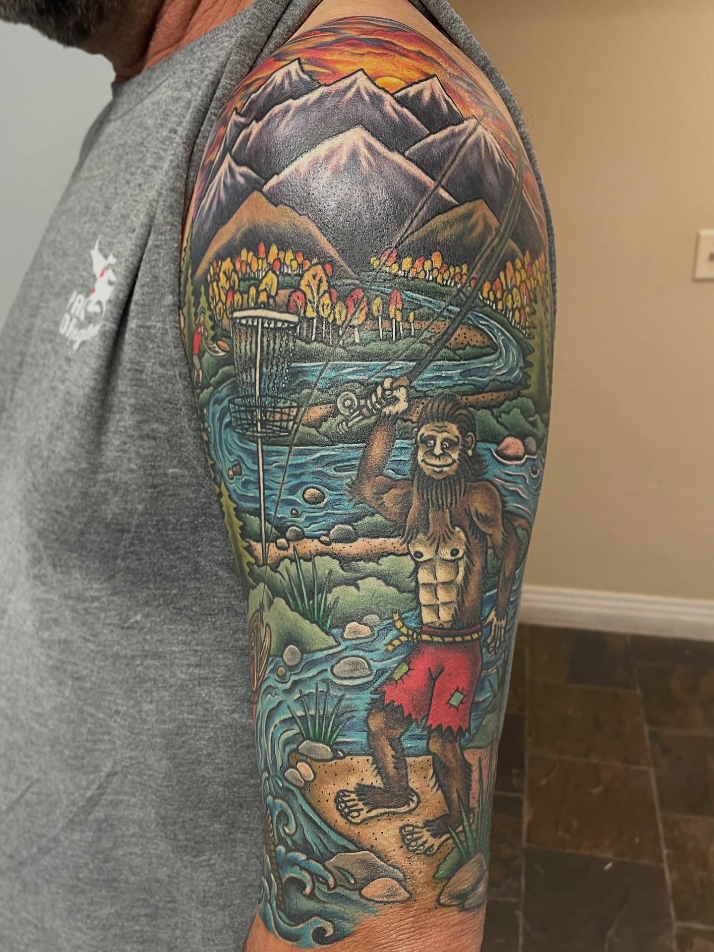 Bigfoot fishing American traditional tattoo on the forearm by πΌπ
ππΎπππππ